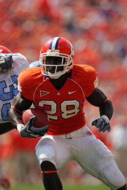 CLEMSON, SC - SEPTEMBER 23:  C.J. Spiller #28 of the Clemson Tigers runs runs with the ball as the Clemson Tigers host visiting University of North Carolina Tar Heels during their game on September 23, 2006 at Memorial Stadium in Clemson, South Carolina. 