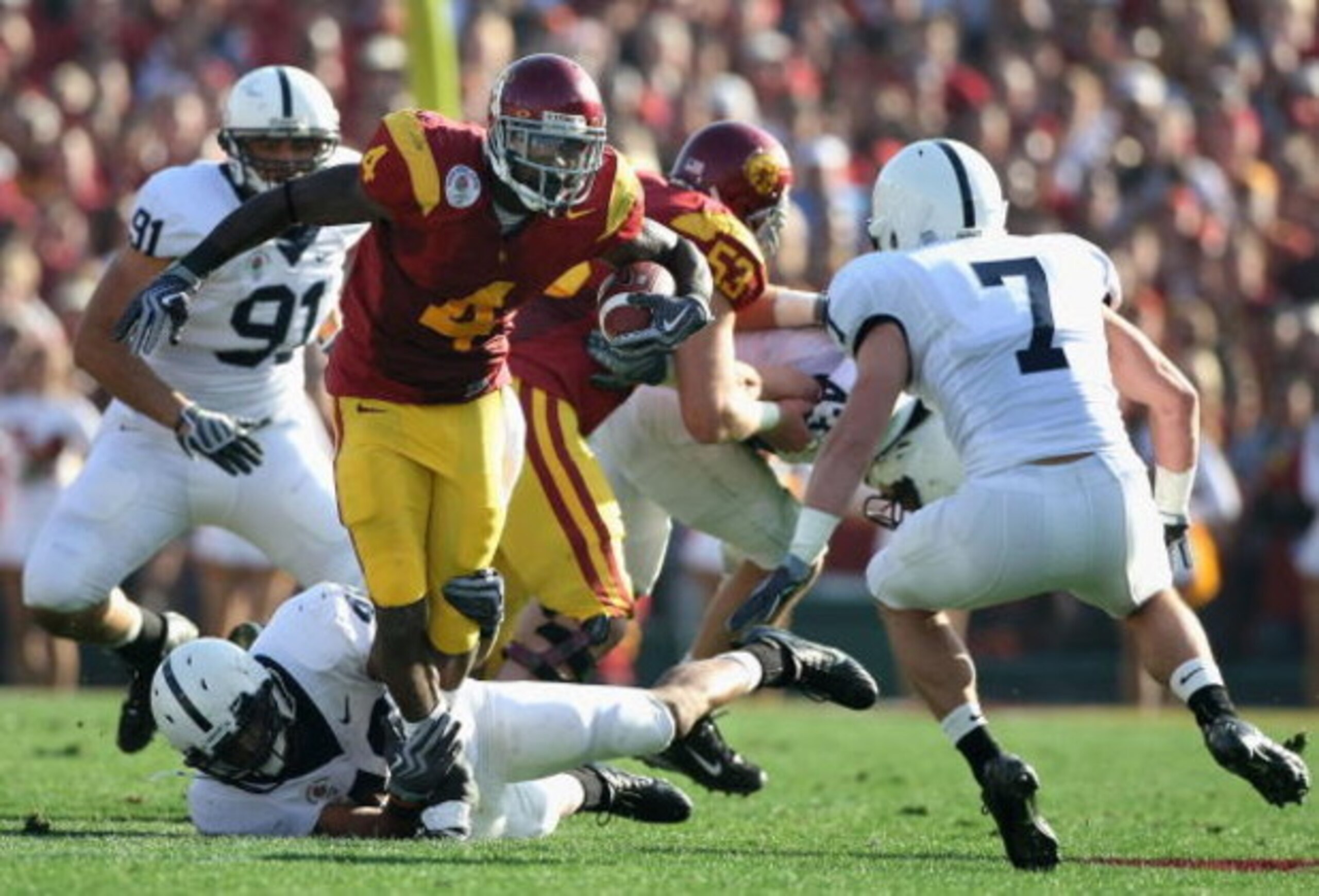 PASADENA, CA - JANUARY 01:  Runningback Joe McKnight #4 of the USC Trojans rushes the ball during the 95th Rose Bowl Game presented by Citi against the Penn State Nittany Lions at the Rose Bowl on January 1, 2009 in Pasadena, California. The Trojans defea