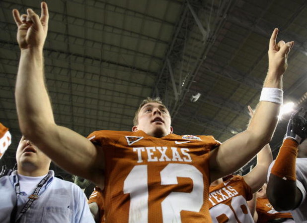 GLENDALE, AZ - JANUARY 05:  Quarterback Colt McCoy #12 of the Texas Longhorns celebrates after defeating the Ohio State Buckeyes in the Tostitos Fiesta Bowl Game on January 5, 2009 at University of Phoenix Stadium in Glendale, Arizona. The Longhorns defea