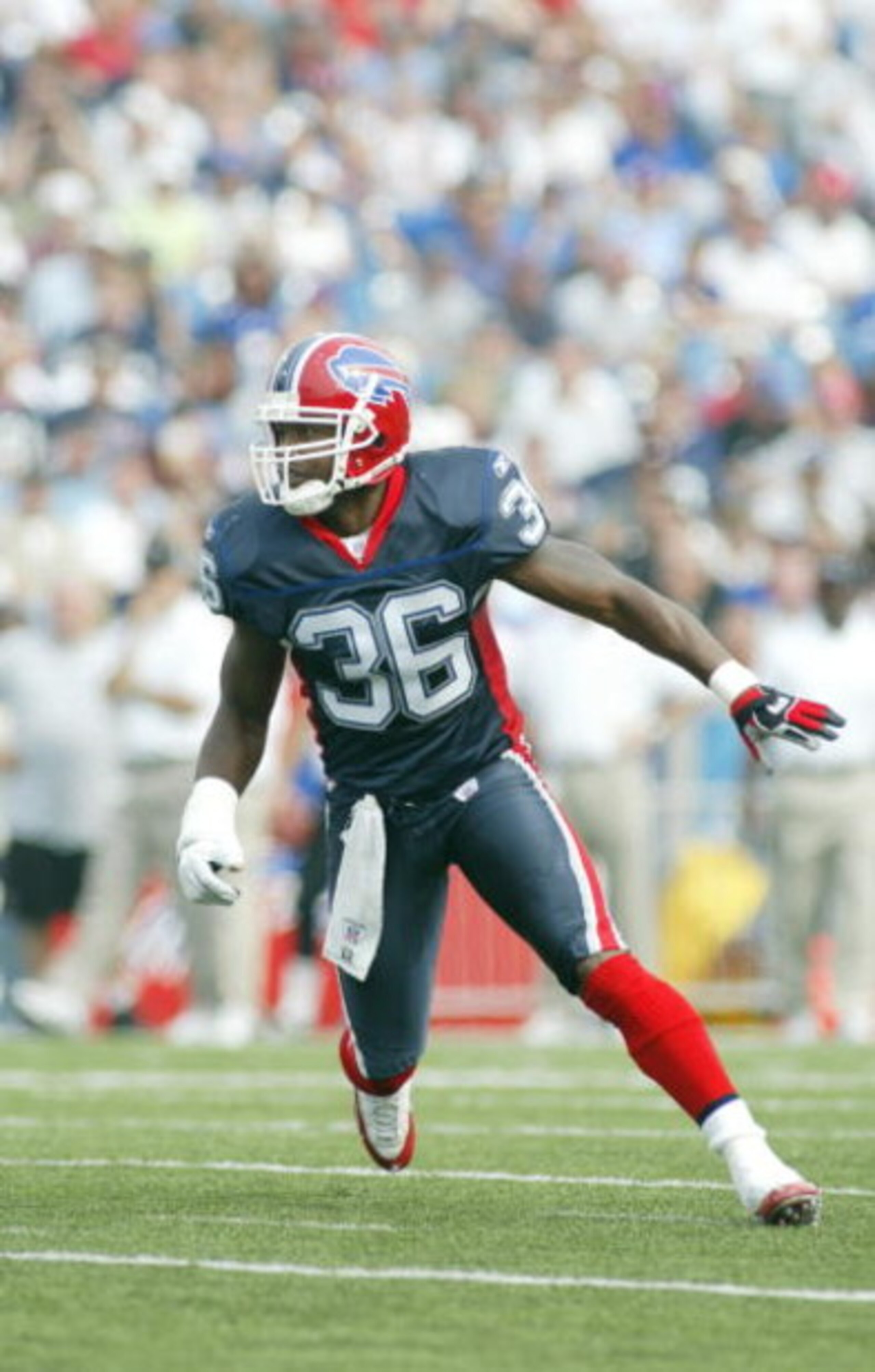 ORCHARD PARK, NY - SEPTEMBER 25:  Safety Lawyer Milloy #36 of the Buffalo Bills looks to make a play against the Atlanta Falcons on September 25, 2005 at Ralph Wilson Stadium in Orchard Park, New York. The Falcons defeated the Bills 24-16.  (Photo by Rick