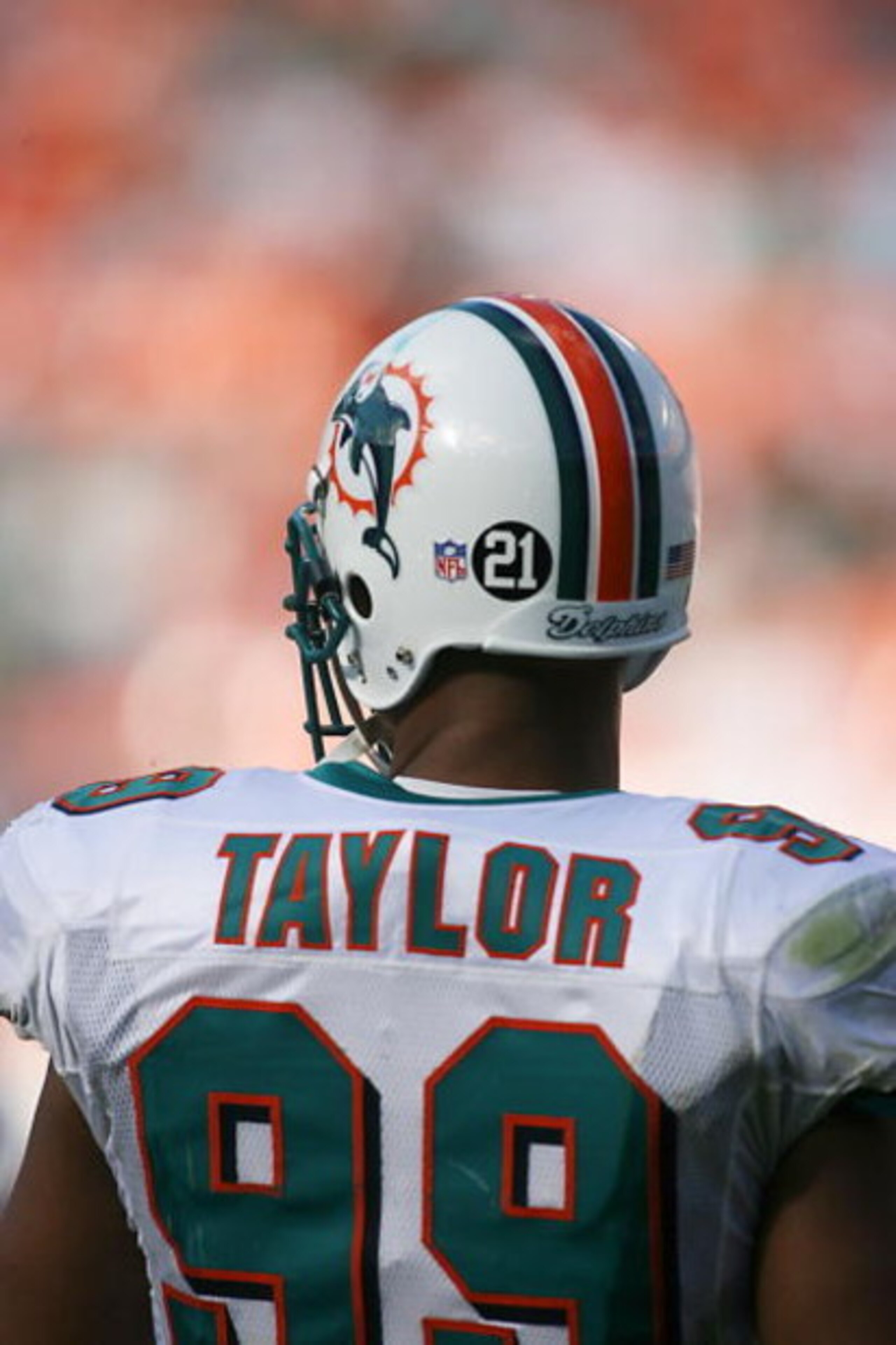 MIAMI - DECEMBER 2: Jason Taylor #99 of the Miami Dolphins displays Sean Talyors #21 on his helmet during the NFL game against the New York Jets at the Dolphin Stadium on December 2, 2007 in Miami, Florida. (Photo by Doug Benc/Getty Images) MIAMI - DECEMBER 2: Jason Taylor #99 of the Miami Dolphins displays Sean Talyors #21 on his helmet during the NFL game against the New York Jets at the Dolphin Stadium on December 2, 2007 in Miami, Florida. (Photo by Doug Benc/Getty Images)