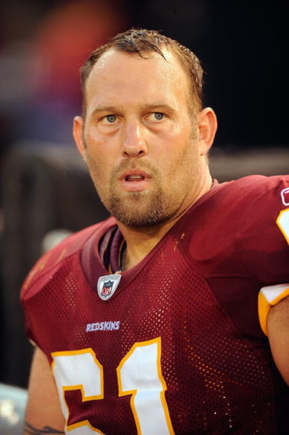 BALTIMORE, MD - AUGUST 13:  Casey Rabach #61 of the Washington Redskins looks on during a NFL preseason football game against the Baltimore Ravens on August 13, 2009 at M & T Bank Stadium in Baltimore, Maryland.   (Photo by Mitchell Layton/Getty Images)