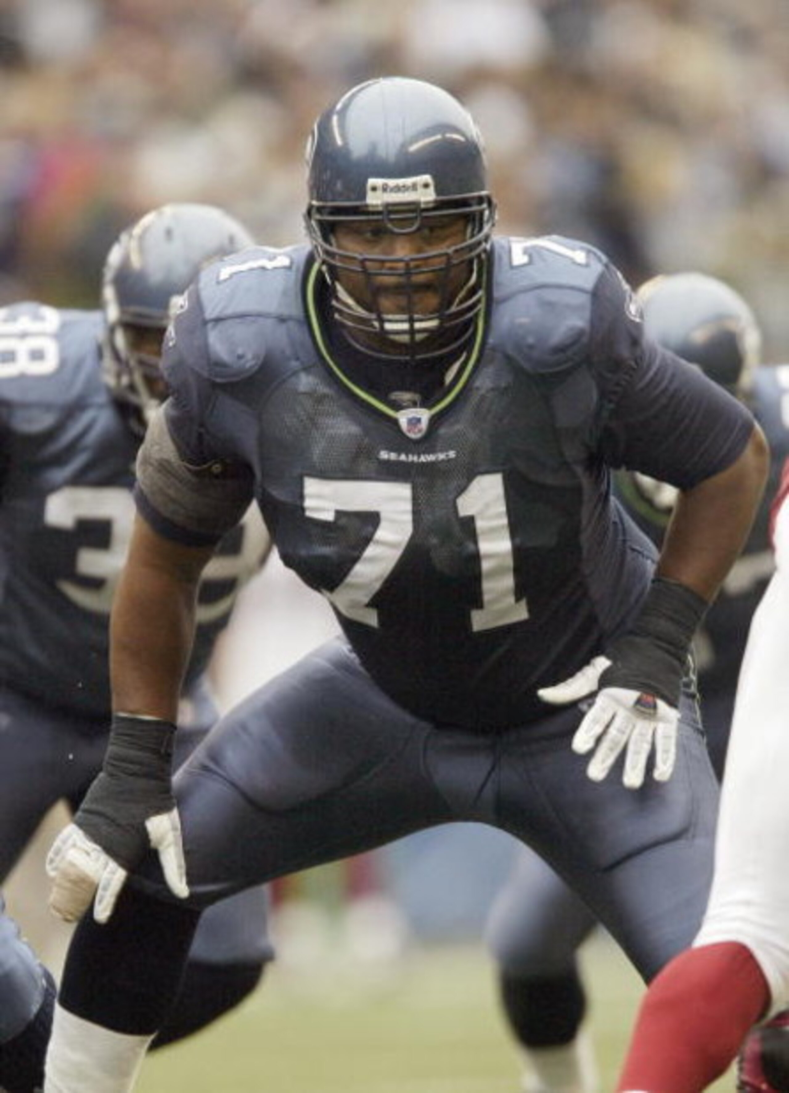 SEATTLE - SEPTEMBER 17: Tackle Walter Jones #71 of the Seattle Seahawks gets ready for the snap against the Arizona Cardinals at Qwest Field on September 17, 2006 in Seattle, Washington. The Seahawks won 21-10. (Photo by Otto Greule Jr/Getty Images) SEATTLE - SEPTEMBER 17: Tackle Walter Jones #71 of the Seattle Seahawks gets ready for the snap against the Arizona Cardinals at Qwest Field on September 17, 2006 in Seattle, Washington. The Seahawks won 21-10. (Photo by Otto Greule Jr/Getty Images)