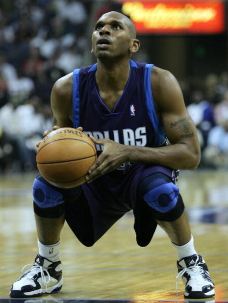 MEMPHIS - MAY 1:   Jerry Stackhouse #42 of the Dallas Mavericks shoots a free throw in the second half against the Memphis Grizzlies in game four of the Western Conference Quarterfinals during the 2006 NBA Playoffs at FedExForum on May 1, 2006 in Memphis,