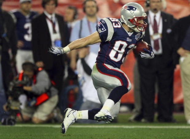 GLENDALE, AZ - FEBRUARY 03:  Wes Welker #83 of the New England Patriots runs for a first down against the New York Giants during Super Bowl XLII on February 3, 2008 at the University of Phoenix Stadium in Glendale, Arizona. The Giants won 17-14.  (Photo b