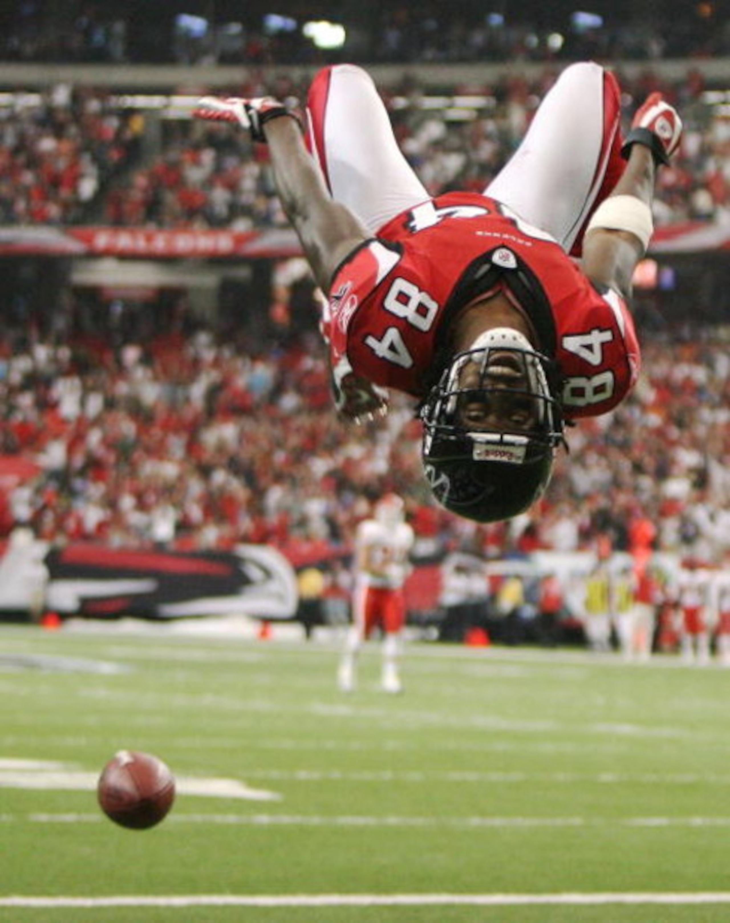 ATLANTA - SEPTEMBER 21: Wide receiver Roddy White #84 of the Atlanta Falcons does a back-flip to celebrate his touchdown in the first quarter against the Kansas City Chiefs at Georgia Dome on September 21, 2008 in Atlanta, Georgia. The Falcons defeated t ATLANTA - SEPTEMBER 21: Wide receiver Roddy White #84 of the Atlanta Falcons does a back-flip to celebrate his touchdown in the first quarter against the Kansas City Chiefs at Georgia Dome on September 21, 2008 in Atlanta, Georgia. The Falcons defeated t
