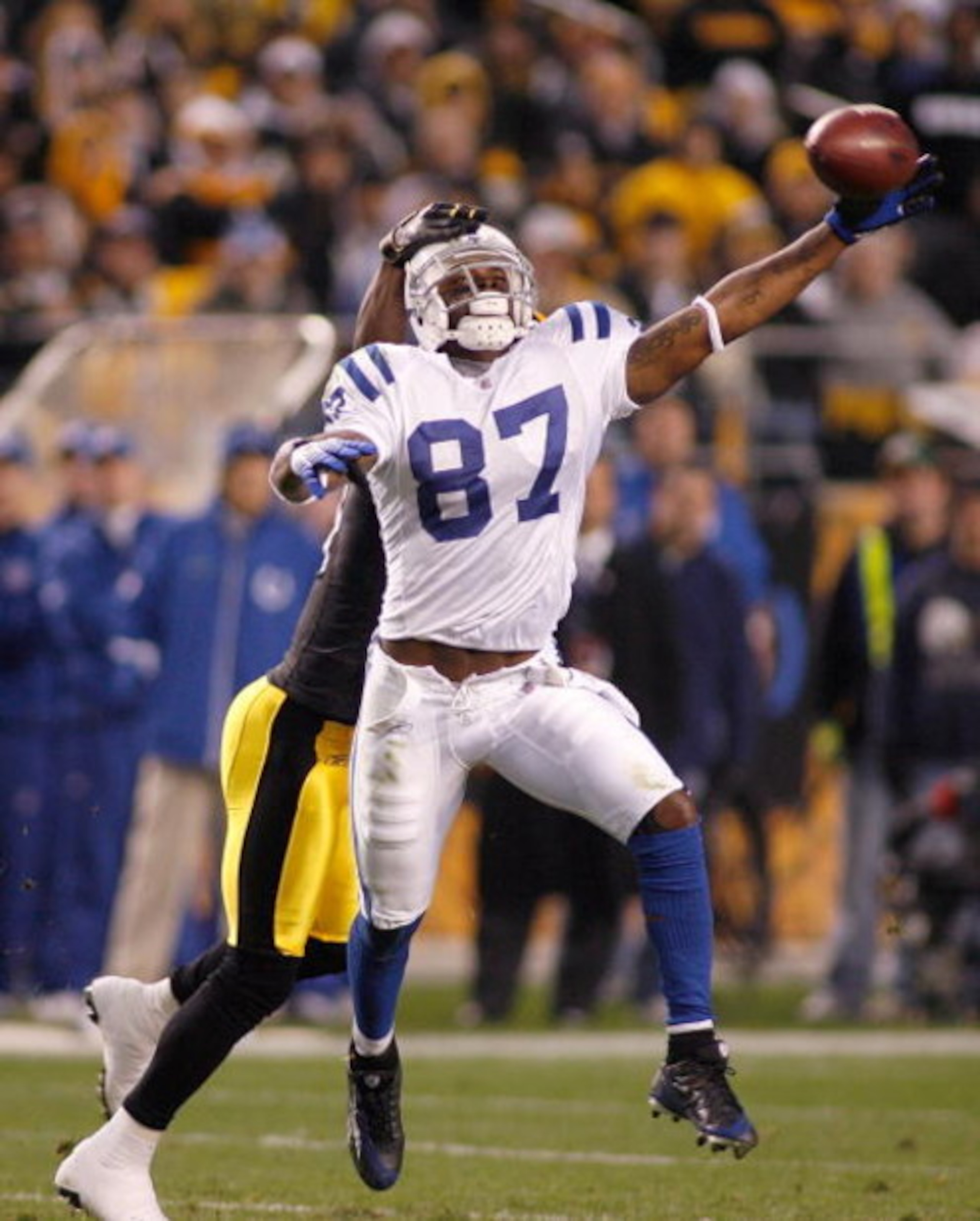 PITTSBURGH - NOVEMBER 09: Reggie Wayne #87 of the Indianapolis Colts makes an unsucessful attempt to catch a pass as Ike Taylor #24 of the Pittsburgh Steelers defends on November 9, 2008 at Heinz Field in Pittsburgh, Pennsylvania. (Photo by Rick Stewart/ PITTSBURGH - NOVEMBER 09: Reggie Wayne #87 of the Indianapolis Colts makes an unsucessful attempt to catch a pass as Ike Taylor #24 of the Pittsburgh Steelers defends on November 9, 2008 at Heinz Field in Pittsburgh, Pennsylvania. (Photo by Rick Stewart/