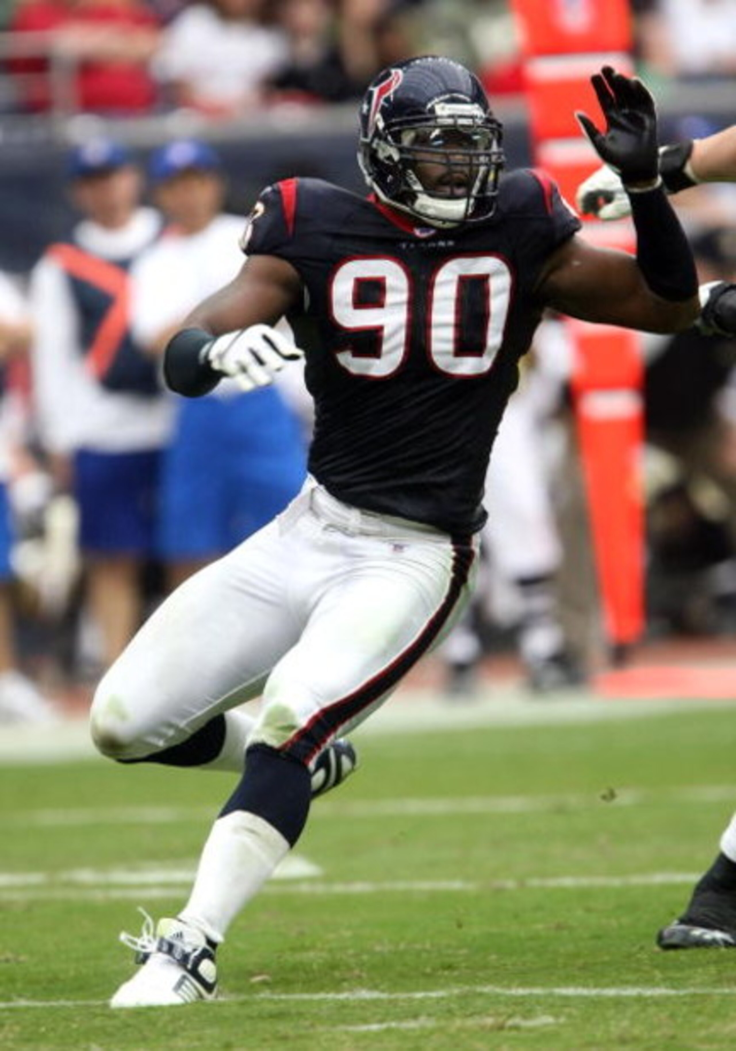HOUSTON - NOVEMBER 18: Defensive end Mario Williams #90 of the Houston Texans rushes against the New Orleans Saints on November 18, 2007 at Reliant Stadium in Houston, Texas. The Texans defeated the Saints 23-10. (Photo by Stephen Dunn/Getty Images) HOUSTON - NOVEMBER 18: Defensive end Mario Williams #90 of the Houston Texans rushes against the New Orleans Saints on November 18, 2007 at Reliant Stadium in Houston, Texas. The Texans defeated the Saints 23-10. (Photo by Stephen Dunn/Getty Images)