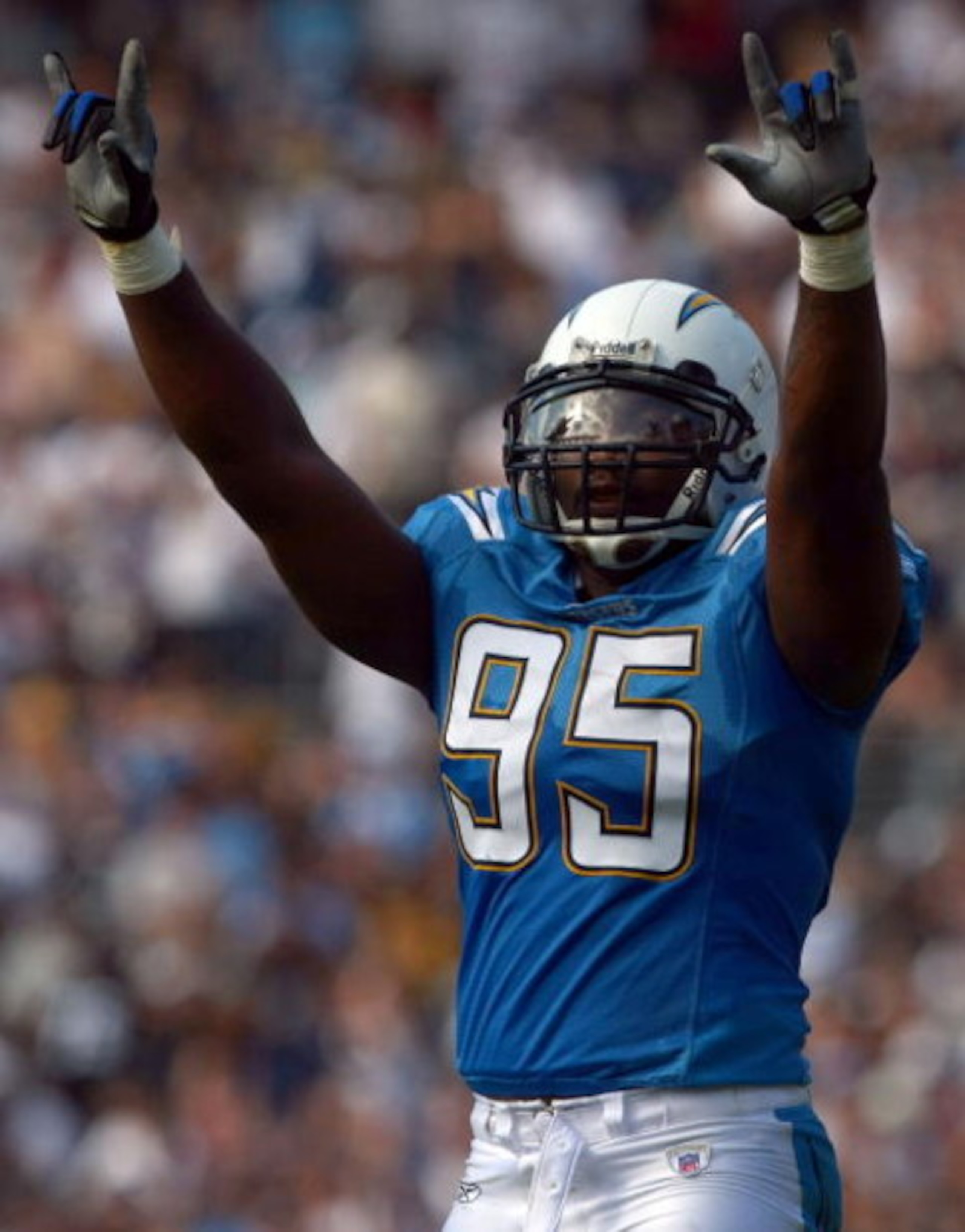 SAN DIEGO - OCTOBER 14: Linebacker Shaun Phillips #95 of the San Diego Chargers celebrates a sack during their game against the Oakland Raiders in the first half on October 14, 2007 at Qualcomm Stadium in San Diego, California. (Photo by Donald Miralle/ SAN DIEGO - OCTOBER 14: Linebacker Shaun Phillips #95 of the San Diego Chargers celebrates a sack during their game against the Oakland Raiders in the first half on October 14, 2007 at Qualcomm Stadium in San Diego, California. (Photo by Donald Miralle/