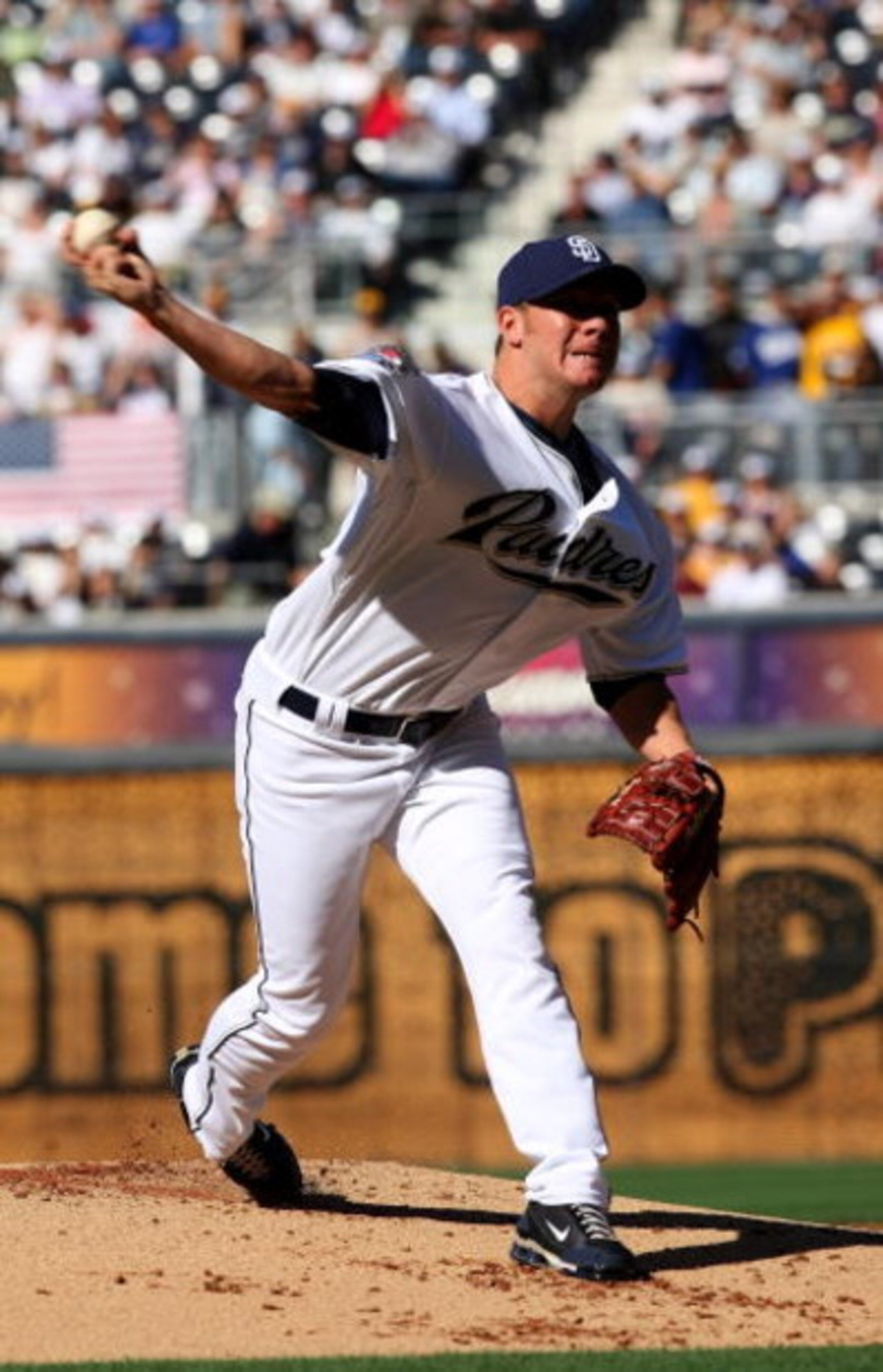 SAN DIEGO - APRIL 6: Pitcher Jake Peavy #44 of the San Diego Padres throws a pitch against the Los Angeles Dodgers on Opening Day on April 6, 2009 at Petco Park in San Diego, California. (Photo by Stephen Dunn/Getty Images) SAN DIEGO - APRIL 6: Pitcher Jake Peavy #44 of the San Diego Padres throws a pitch against the Los Angeles Dodgers on Opening Day on April 6, 2009 at Petco Park in San Diego, California. (Photo by Stephen Dunn/Getty Images)
