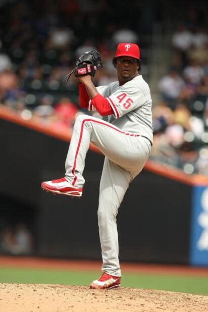 NEW YORK - AUGUST 23:  Pedro Martinez #45 of the Philadelphia Phillies pitches against The New York Mets during their game on August 23, 2009 at Citi Field in the Flushing neighborhood of the Queens borough of New York City.  (Photo by Al Bello/Getty Imag
