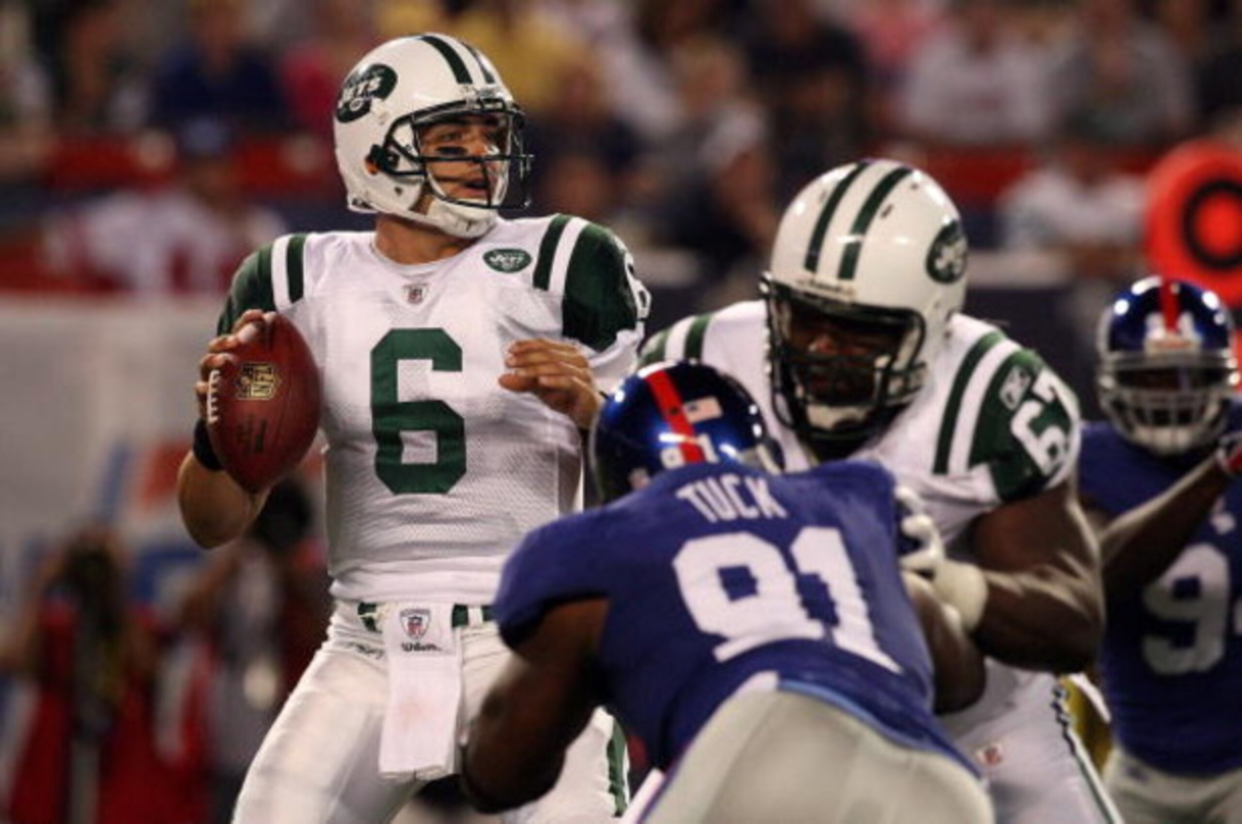 EAST RUTHERFORD, NJ - AUGUST 29:  Mark Sanchez #6 of the New York Jets throws a pass against the New York Giants on August 29, 2009 at Giants Stadium in East Rutherford, New Jersey.  (Photo by Jim McIsaac/Getty Images)