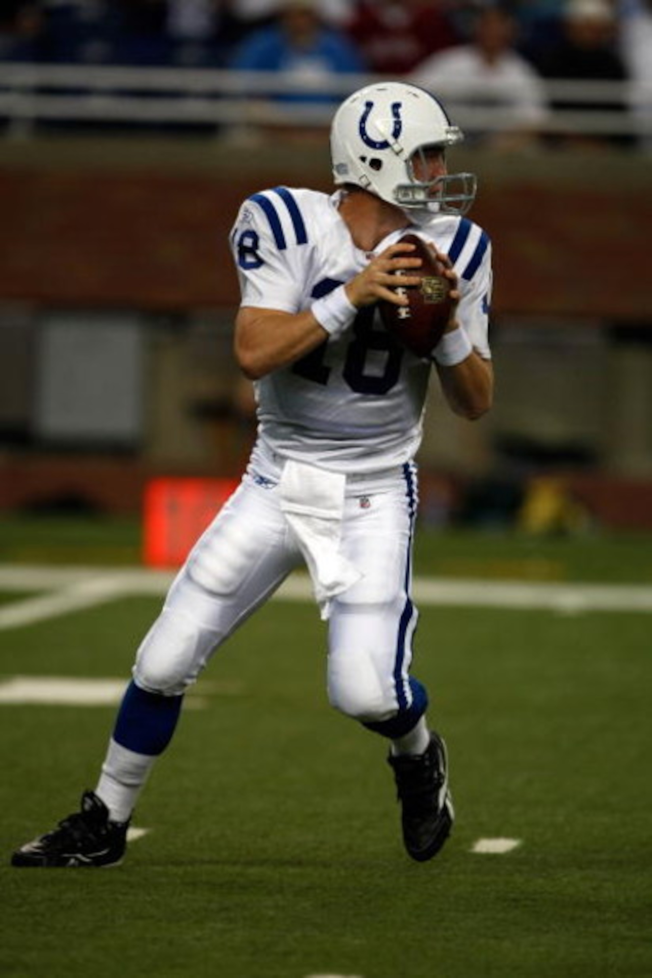 DETROIT, MI - AUGUST 28: Quarterback Peyton Manning #18 of the Indianapolis Colts drops back to pass the football against the Detroit Lions at Ford Field on August 28, 2009 in Detroit, Michigan.  (Photo by Scott Boehm/Getty Images)