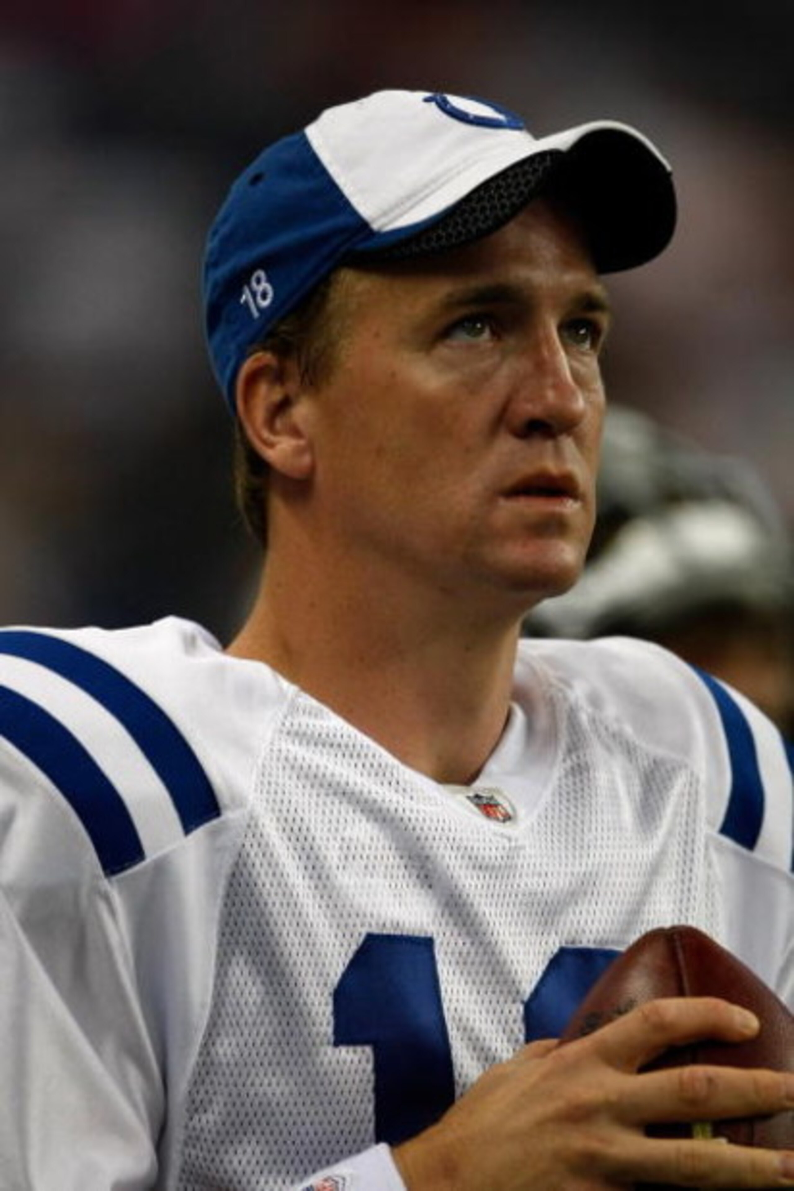 DETROIT, MI - AUGUST 28: Quarterback Peyton Manning #18 of the Indianapolis Colts watches the action on the field  from the sidelines against the Detroit Lions at Ford Field on August 28, 2009 in Detroit, Michigan.  (Photo by Scott Boehm/Getty Images)