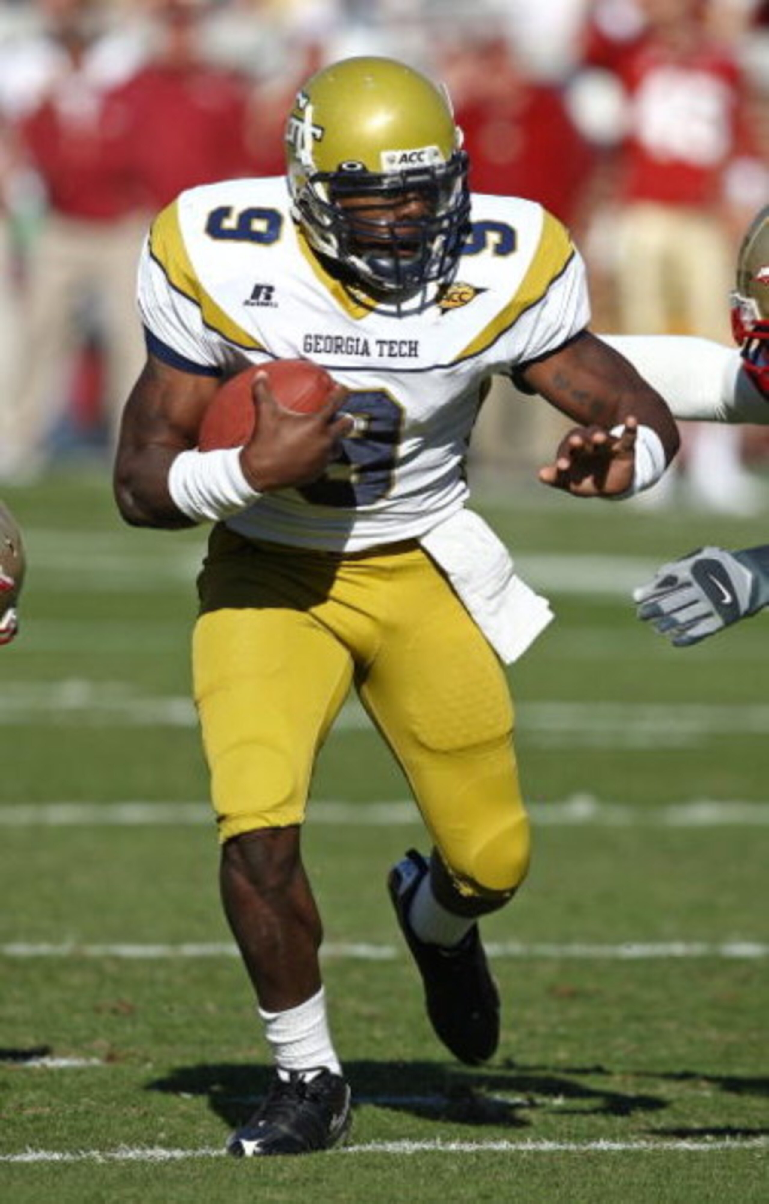 ATLANTA - NOVEMBER 1:  Quarterback Josh Nesbitt #9 of the Georgia Tech Yellow Jackets attempts to run upfield during the game against the Florida State Seminoles at Bobby Dodd Stadium at Historic Grant Field on November 1, 2008 in Atlanta, Georgia.  Georg