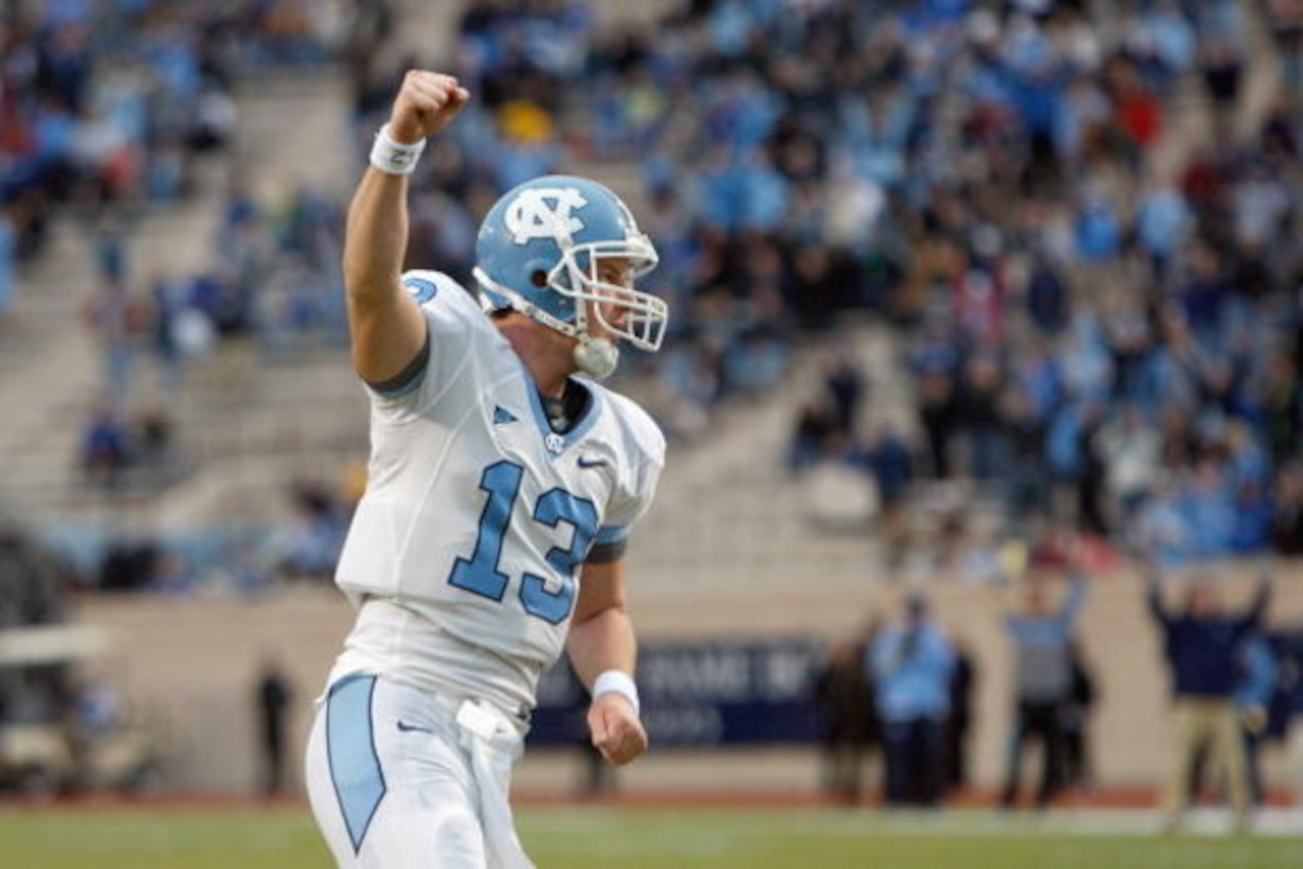 DURHAM, NC - NOVEMBER 29:  Quarterback T.J. Yates #13 of the North Carolina Tar Heels celebrates on the field during the game against the Duke Blue Devils at Wallace Wade Stadium on November 29, 2008 in Durham, North Carolina. (Photo by Kevin C. Cox/Getty