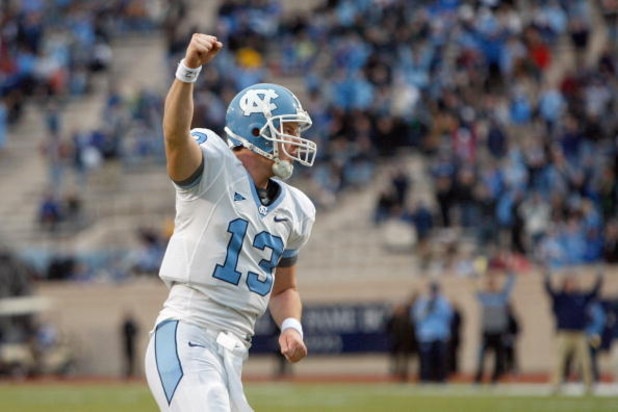 DURHAM, NC - NOVEMBER 29:  Quarterback T.J. Yates #13 of the North Carolina Tar Heels celebrates on the field during the game against the Duke Blue Devils at Wallace Wade Stadium on November 29, 2008 in Durham, North Carolina. (Photo by Kevin C. Cox/Getty