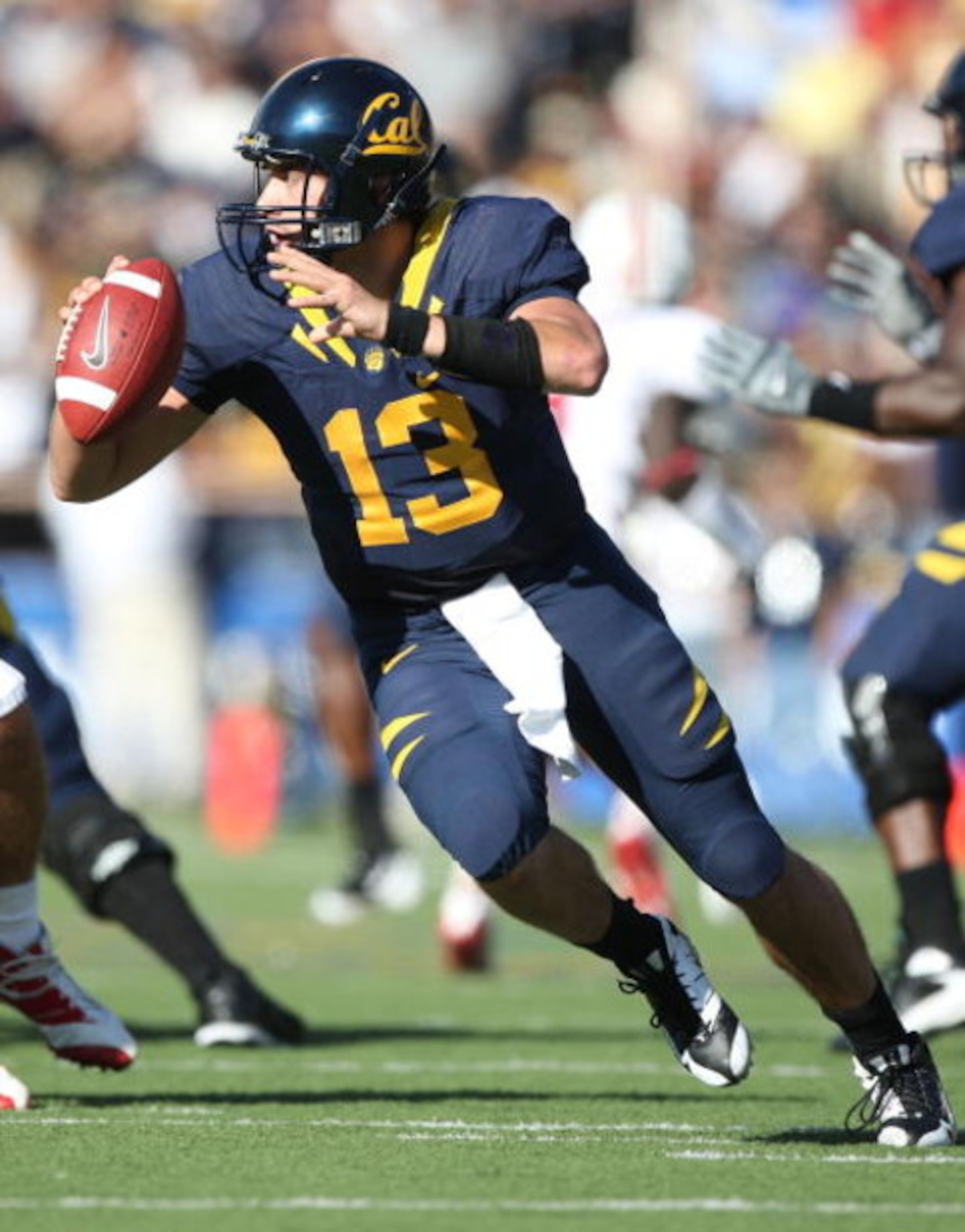 BERKELEY, CA - NOVEMBER 22:  Kevin Riley #13 of the California Golden Bears passes against the Stanford Cardinal during an NCAA football game on November 22, 2008 at Memorial Stadium in Berkeley, California.  (Photo by Jed Jacobsohn/Getty Images)
