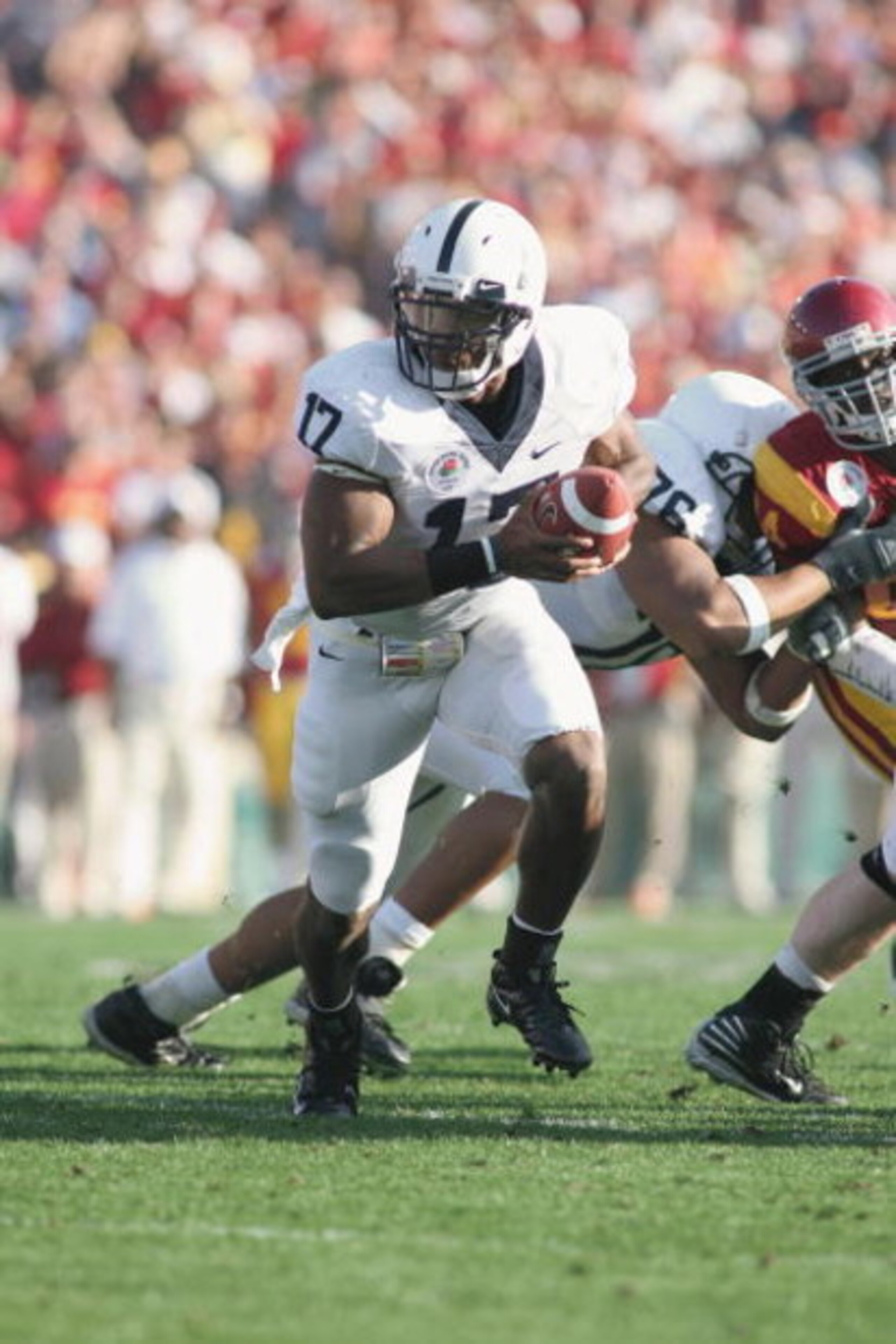 PASADENA, CA - JANUARY 1:  Daryll Clark #17 of the Penn State Nittany Lions scrambles against the USC Trojans on January 1, 2009 at the Rose Bowl in Pasadena, California.  USC won 38-24.  (Photo by Jeff Golden/Getty Images)