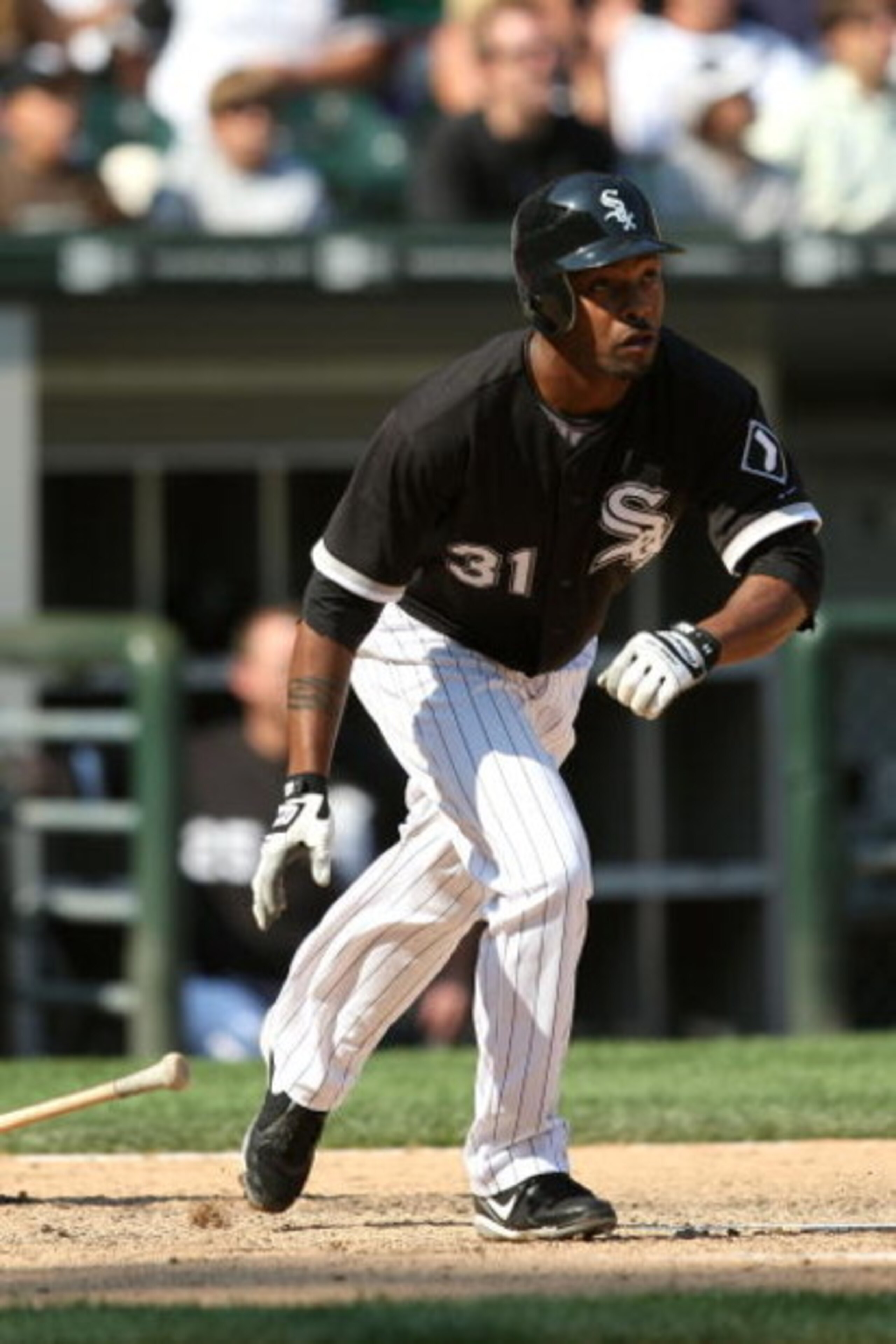 CHICAGO - AUGUST 06:  Dewayne Wise #31 of the Chicago White Sox hits a solo home run in the bottom of the ninth inning against the Los Angeles Angels of Anaheim at U.S. Cellular Field on August 6, 2009 in Chicago, Illinois.  (Photo by Jonathan Daniel/Gett