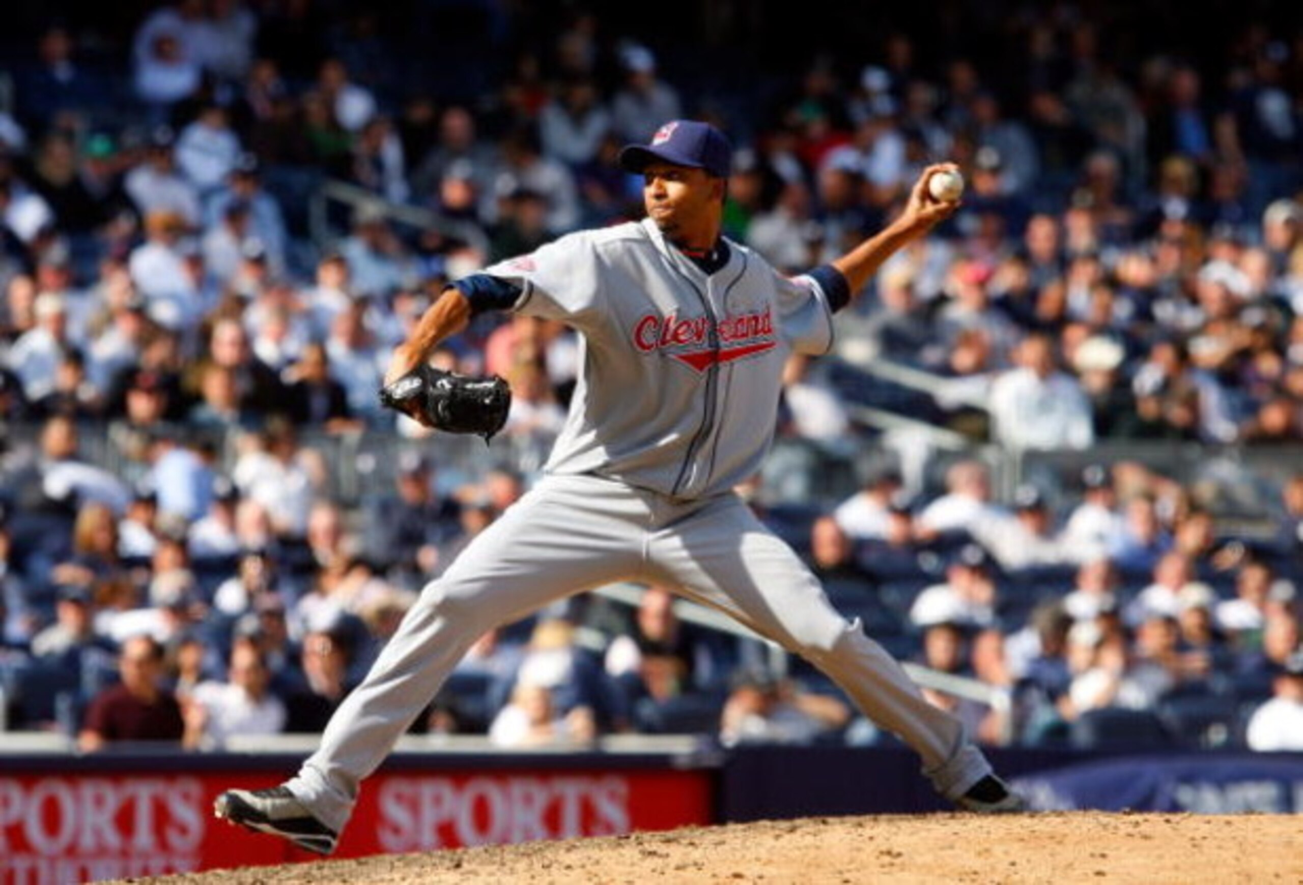 NEW YORK - APRIL 16:  Rafael Perez #53 of the Cleveland Indians pitches against the New York Yankees during opening day at the new Yankee Stadium on April 16, 2009 in the Bronx borough of New York City. This is the first regular season MLB game being play