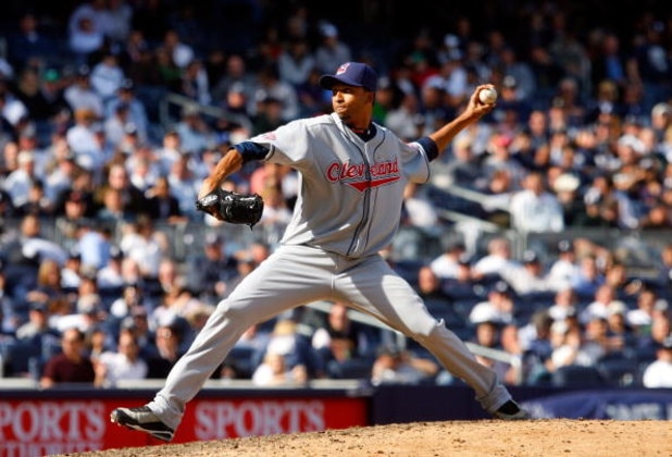 NEW YORK - APRIL 16:  Rafael Perez #53 of the Cleveland Indians pitches against the New York Yankees during opening day at the new Yankee Stadium on April 16, 2009 in the Bronx borough of New York City. This is the first regular season MLB game being play