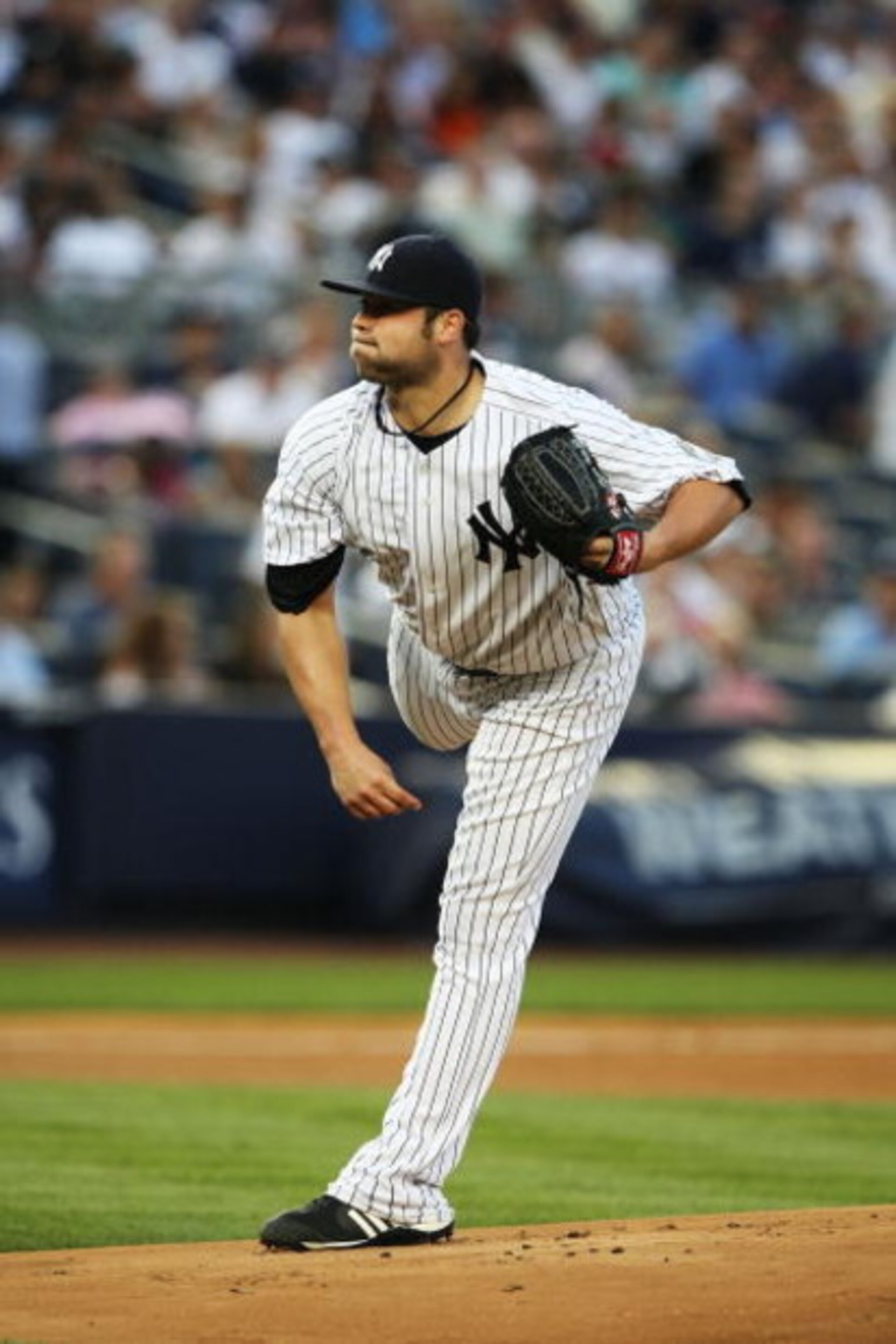 NEW YORK - AUGUST 25:  Joba Chamberlain #62 of The New York Yankees in action against The Texas Rangers during their game on August 25th, 2009 at Yankee Stadium in the Bronx Borough of New York.  (Photo by Al Bello/Getty Images)