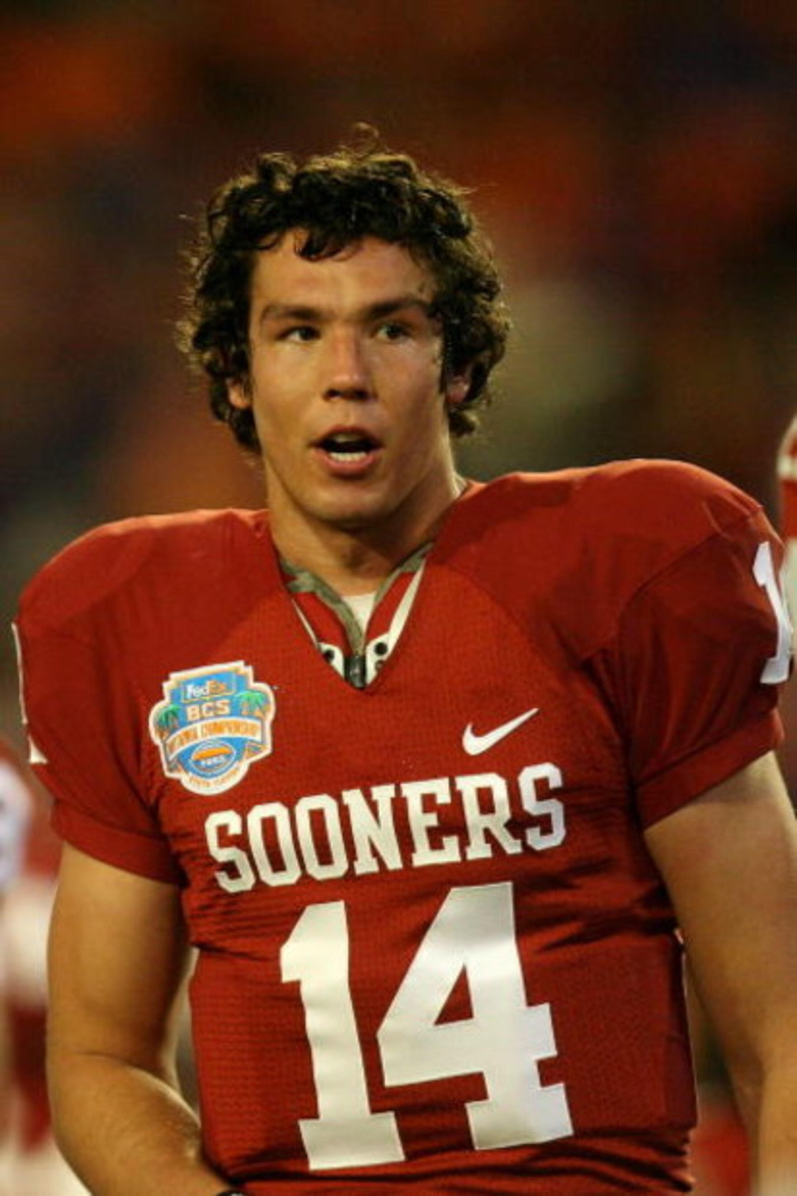 MIAMI - JANUARY 08:  Sam Bradford #14 of the Oklahoma Sooners looks on during warm-ups against the Florida Gators during the FedEx BCS National Championship game at Dolphin Stadium on January 8, 2009 in Miami, Florida.  (Photo by Doug Benc/Getty Images)