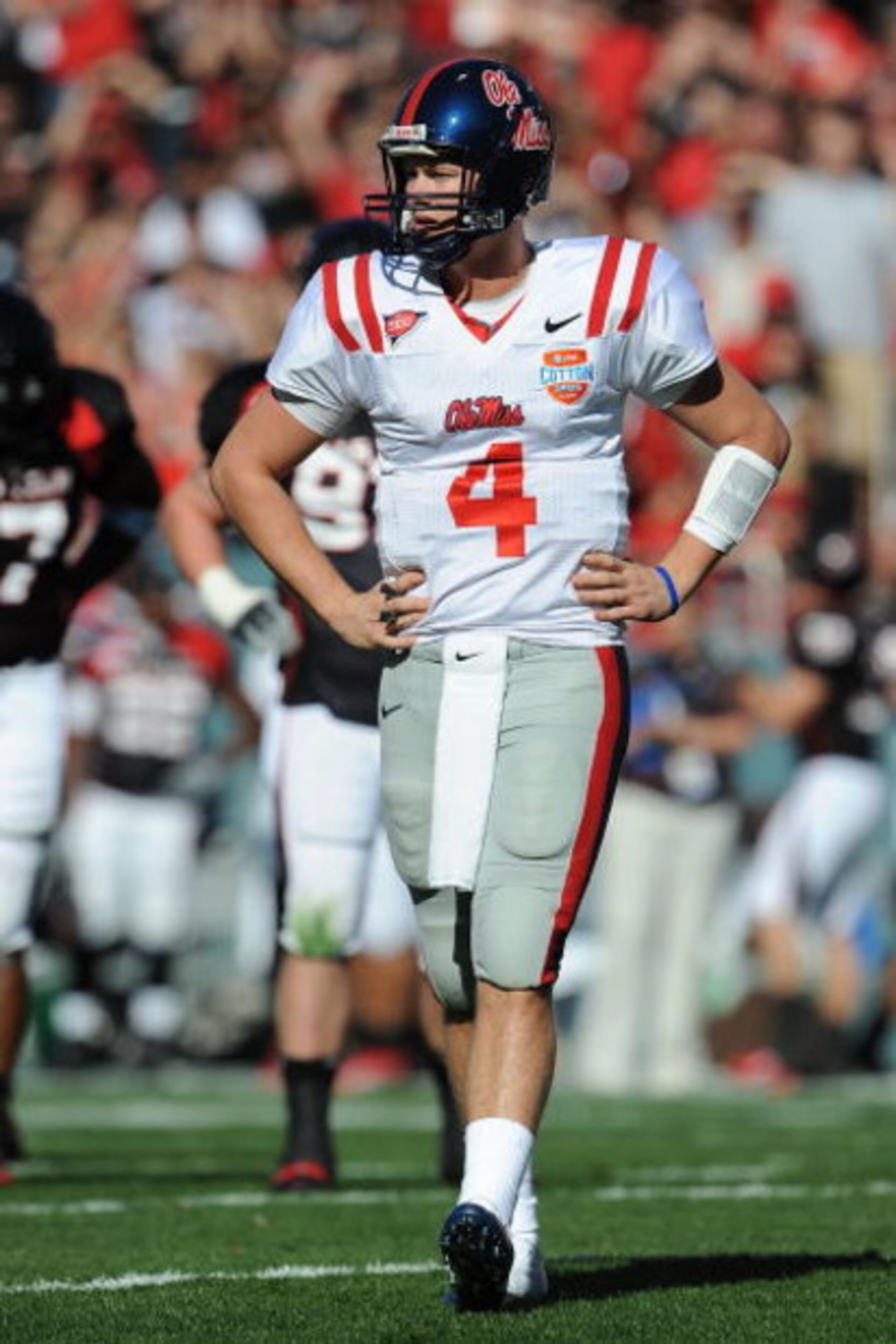 DALLAS - JANUARY 02:  Quarterback Jevan Snead #4 of the Mississippi Rebels drops back to pass against the Texas Tech Red Raiders during the AT&T Cotton Bowl on January 2, 2009 at the Cotton Bowl in Dallas, Texas.  (Photo by Ronald Martinez/Getty Images)