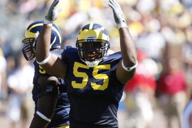 ANN ARBOR, MI - SEPTEMBER 6:  Defensive end Brandon Graham #55 of the Michigan Wolverines raises his arms during the game against the Miami of Ohio Red Hawks on September 6, 2008 at Michigan Stadium in Ann Arbor, Michigan.  The Wolverines defeated the Red