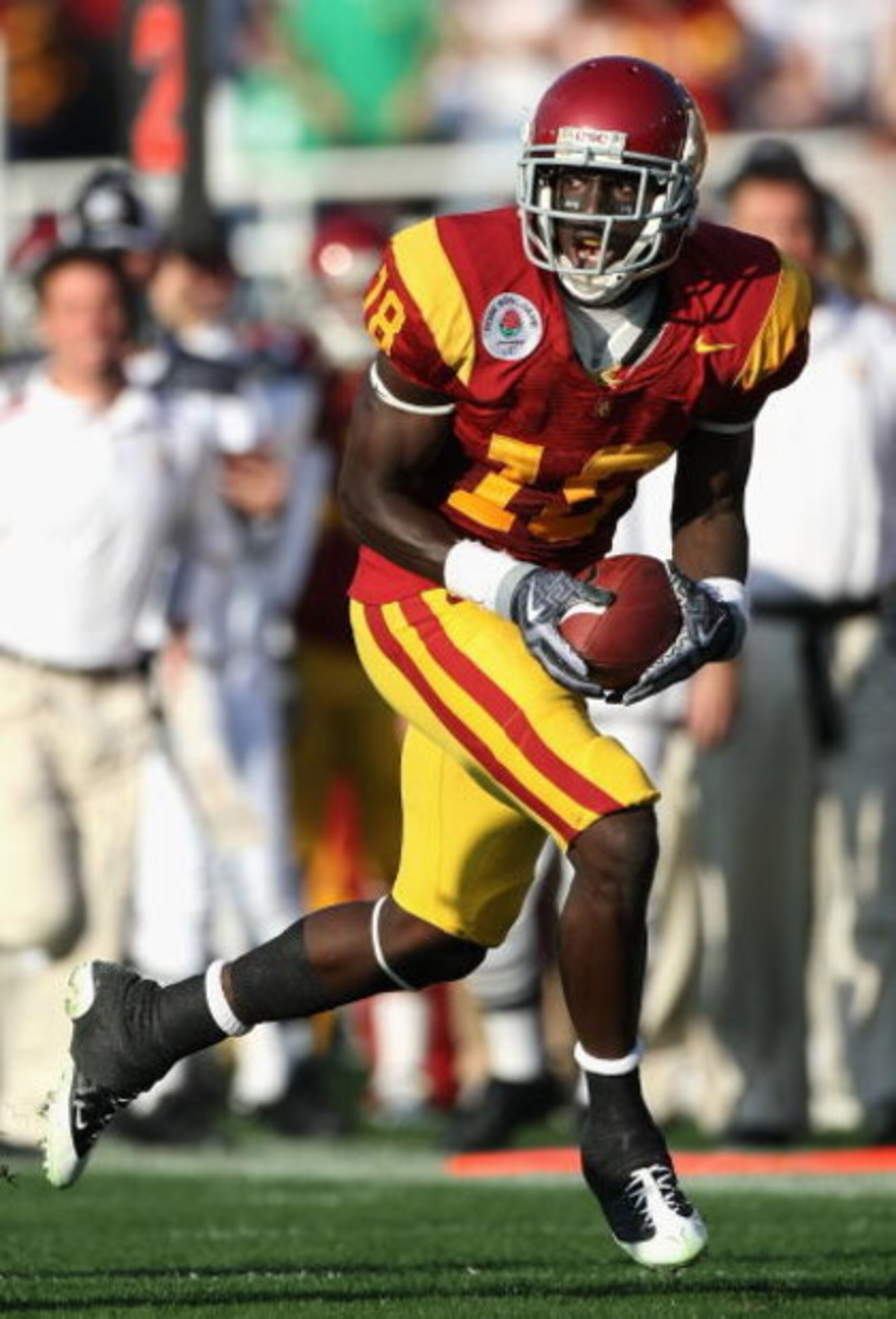 PASADENA, CA - JANUARY 01:  Wide receiver Damian Williams #18 of the USC Trojans runs with the ball after a reception during the 95th Rose Bowl Game presented by Citi against the Penn State Nittany Lions at the Rose Bowl on January 1, 2009 in Pasadena, Ca