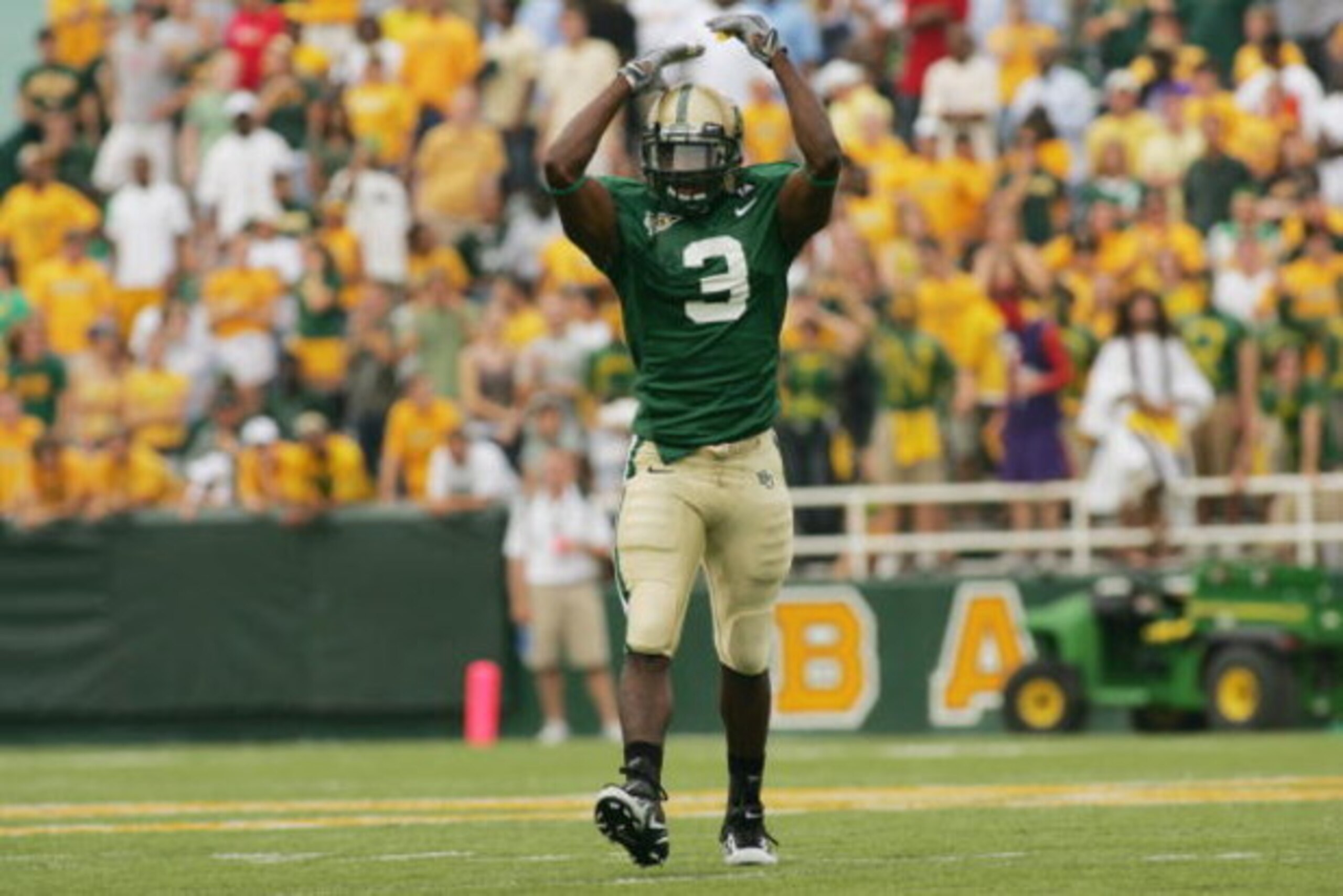 WACO, TX - SEPTEMBER 3:  Cornerback C.J. Wilson #3 of the Baylor Bears celebrates a play during the game against the TCU Horned Frogs on September 3, 2006 at Floyd Casey Stadium in Waco, Texas. TCU defeated Baylor 17-7.  (Photo by Ronald Martinez/Getty Im