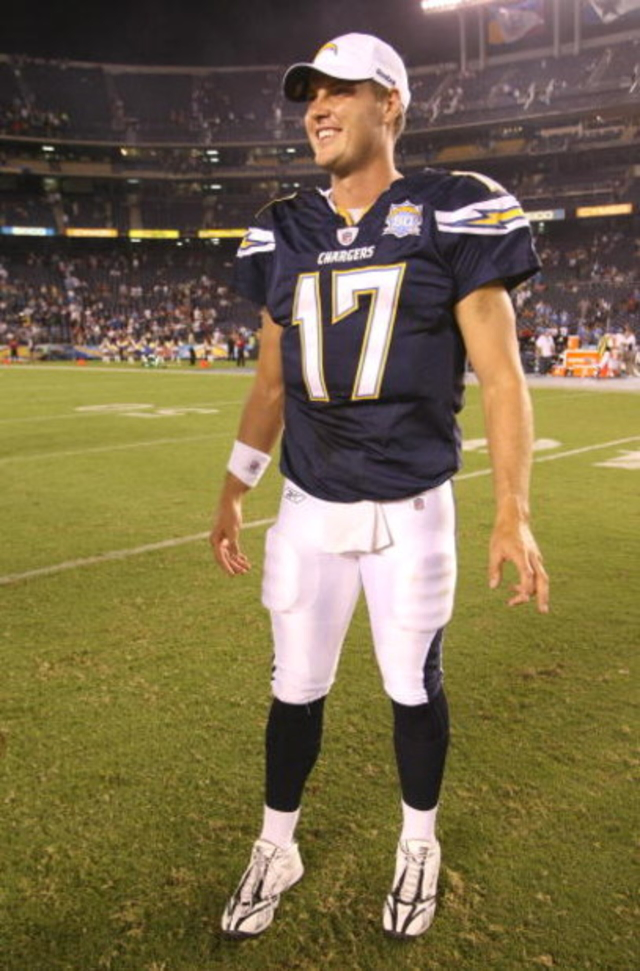 SAN DIEGO - SEPTEMBER 04:  Quarterback Philip Rivers #17 of the San Diego Chargers walks on the field after the game with the San Francisco 49ers  on September 4, 2009 at Qualcomm Stadium in San Diego, California.   The Chrgers won 26-7.  (Photo by Stephe