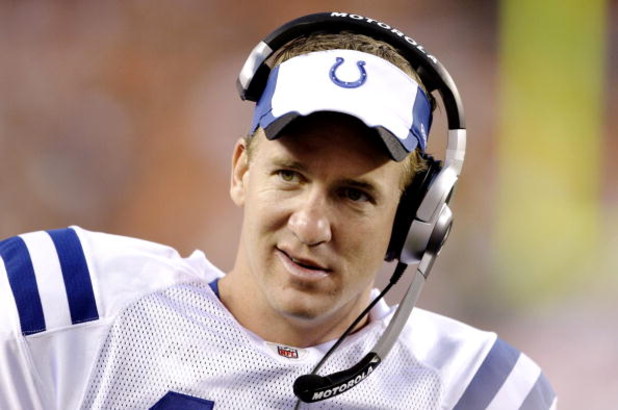 CINCINNATI, OH - AUGUST 3:  Quarterback Peyton Manning #18 of the Indianapolis Colts watches the action against the Cincinnati Bengals during the preseason game on August 3, 2009 at Paul Brown Stadium in Cincinnati, Ohio.  (Photo by Andy Lyons/Getty Image