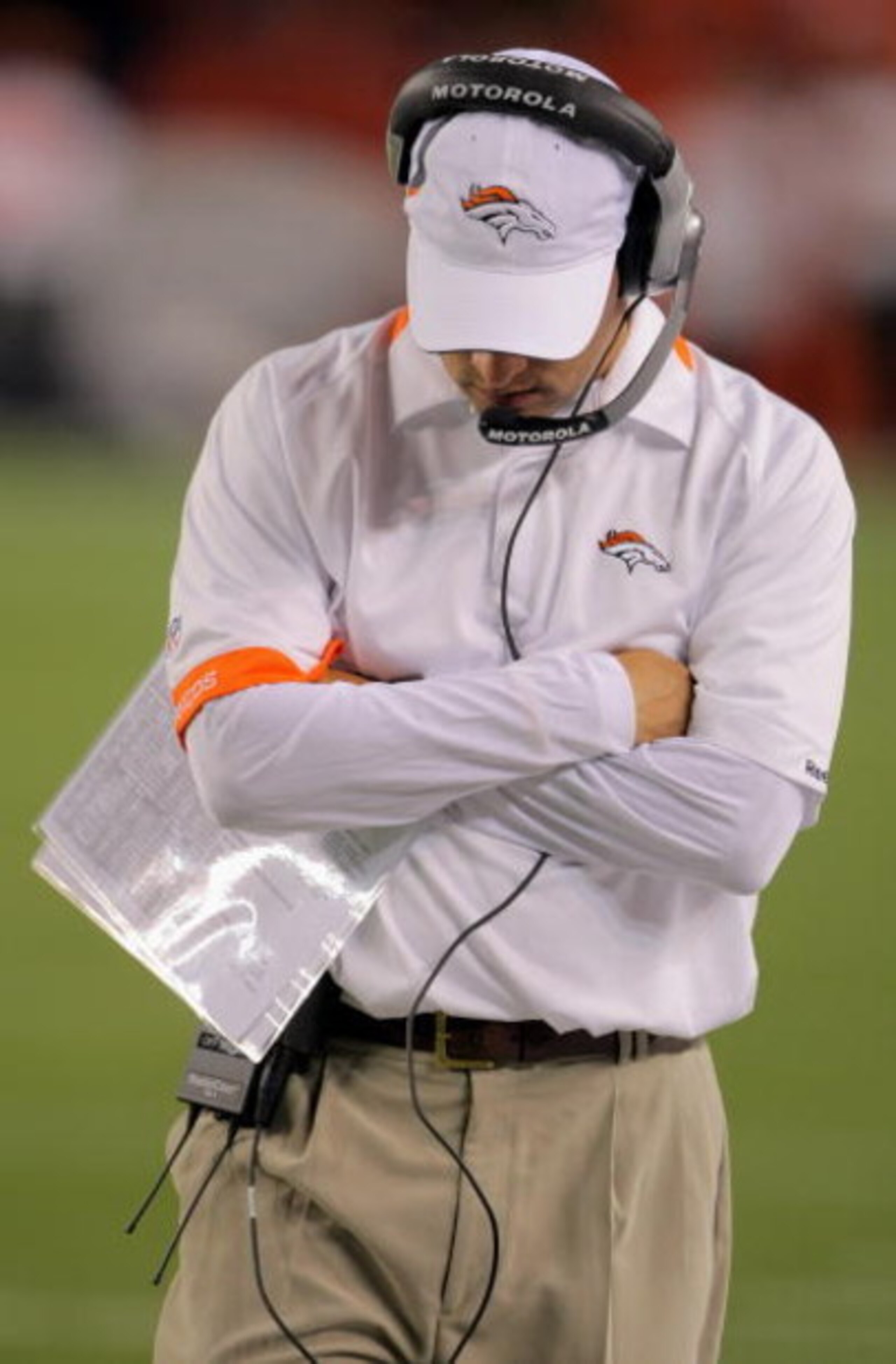 DENVER - SEPTEMBER 03:  Head coach Josh McDaniels of the Denver Broncos walks the sideline as he faces the Arizona Cardinals during preseason NFL action at Invesco Field at Mile High on September 3, 2009 in Denver, Colorado.  The Broncos defeated the Card