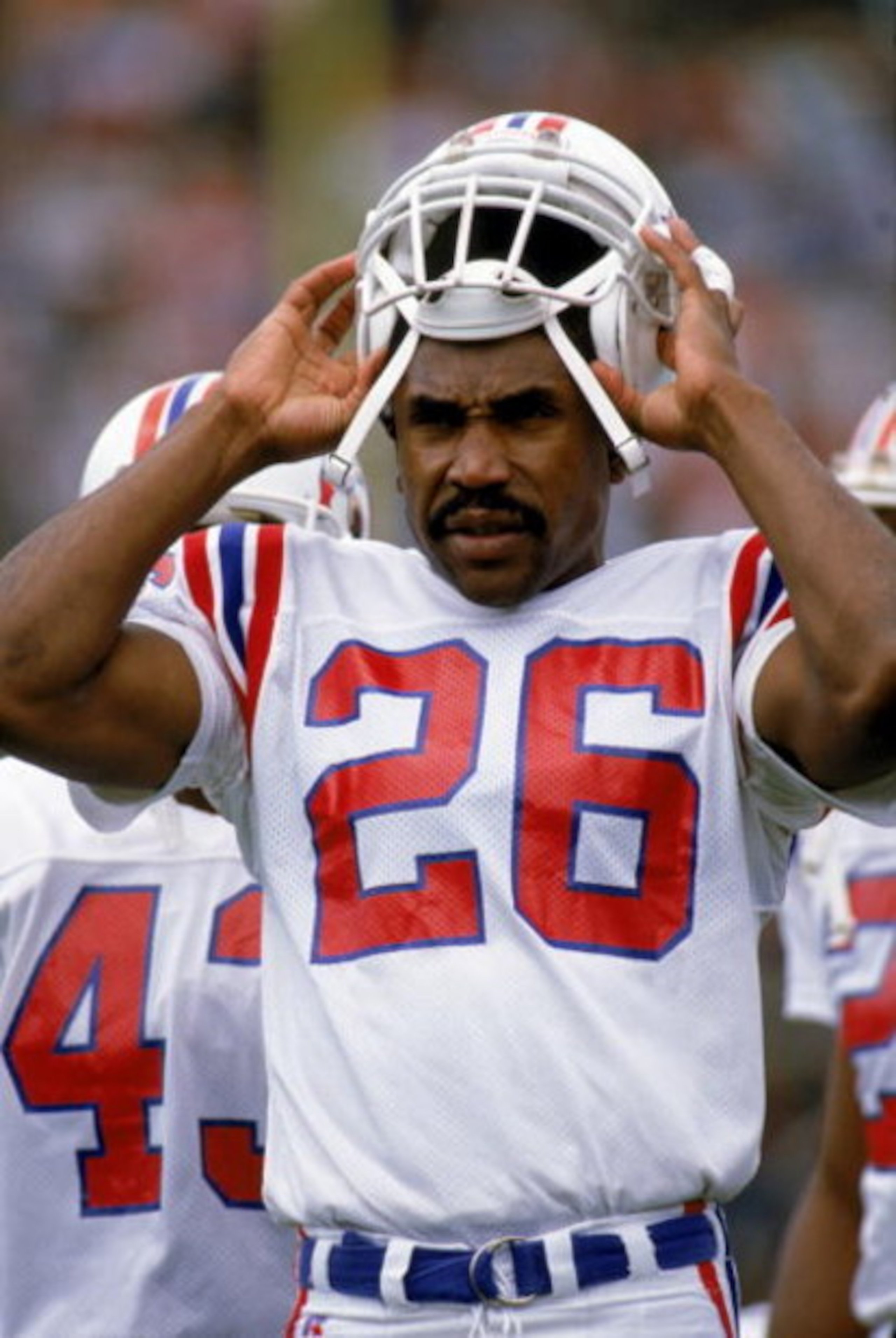 SAN FRANCISCO - OCTOBER 22:  Defensive back Raymond Clayborn #26 of the New England Patriots removes his helmet during a NFL game against the San Francisco 49ers at Candlestick Park on October 22, 1989 in San Francisco, California.  The Niners defeated th