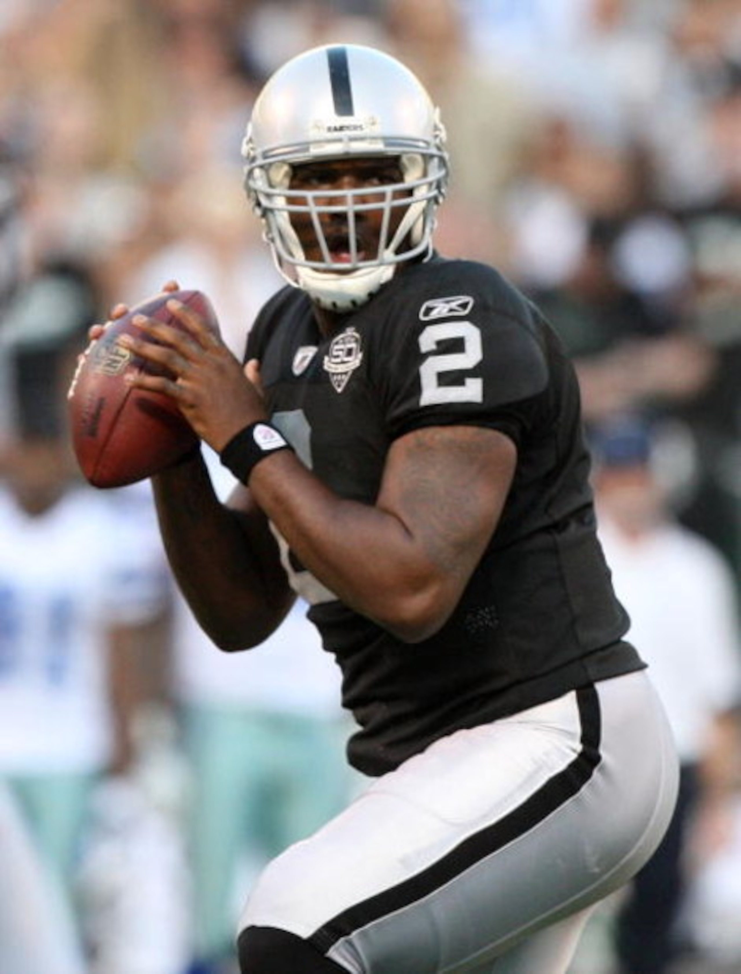 OAKLAND, CA - AUGUST 13: Quarterback JaMarcus Russell #2 of the Oakland Raiders passes the ball in the first quarter against the Dallas Cowboys during the preseason game at Oakland-Alameda County Coliseum on August 13, 2009 in Oakland, California. (Photo 