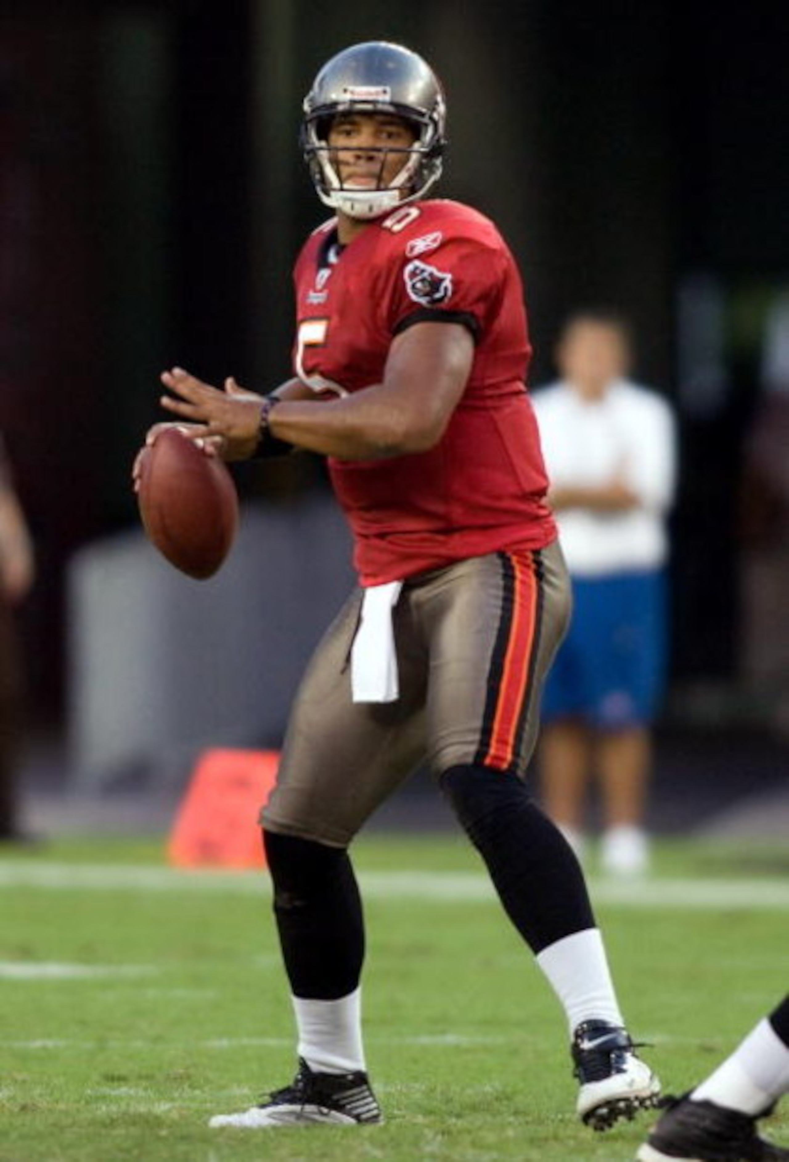 TAMPA, FL - SEPTEMBER 04:  Quarterback Josh Freeman #5 of the Tampa Bay Buccaneers looks for an open receiver against the Houston Texans during a preseason game at Raymond James Stadium on September 4, 2009 in Tampa, Florida.  (Photo by J. Meric/Getty Ima