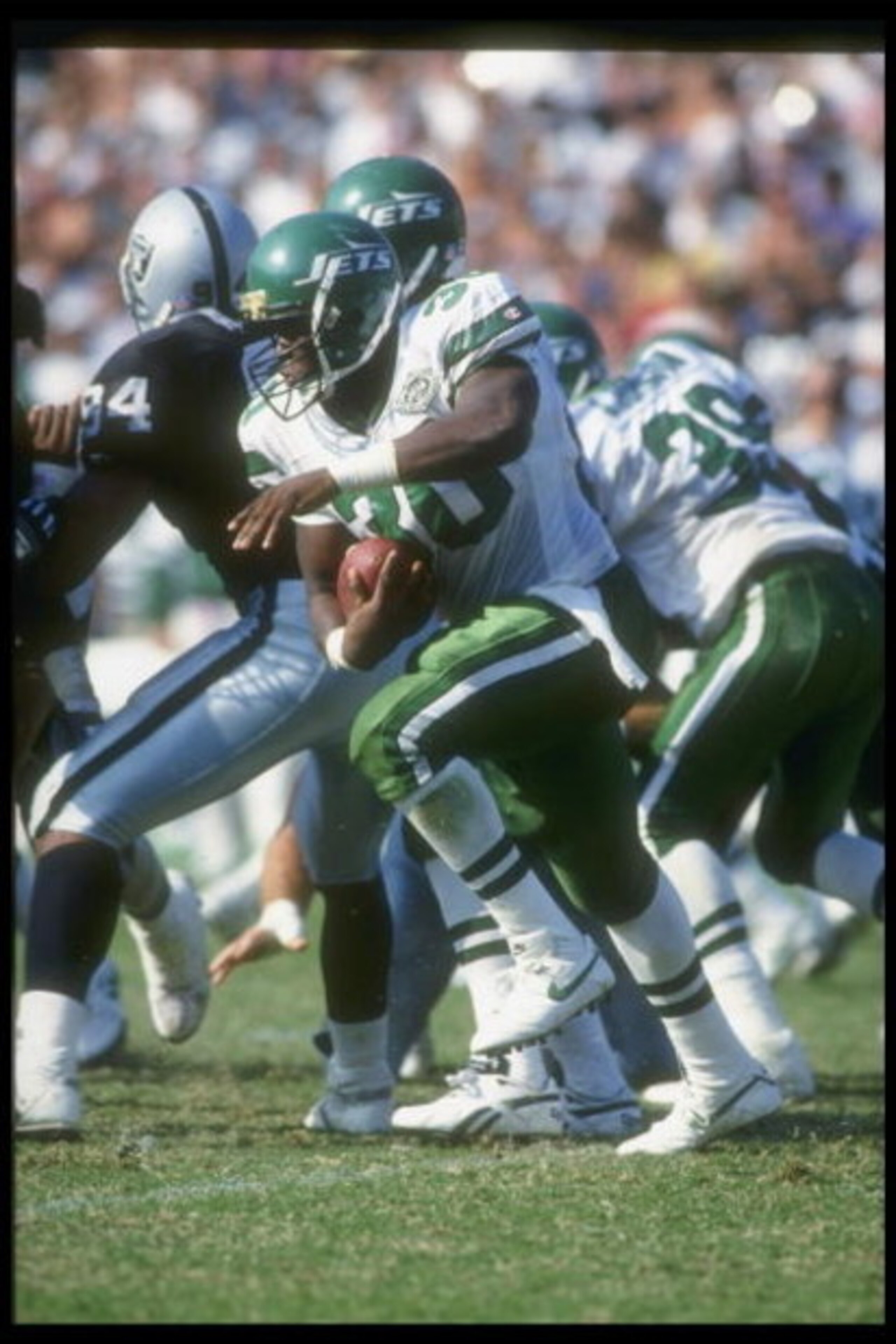 10 Oct 1993:  Running back Brad Baxter of the New York Jets moves the ball during a game against the Los Angeles Raiders at the Coliseum in Los Angeles, California.  The Raiders won the game, 24-20. Mandatory Credit: Stephen Dunn  /Allsport