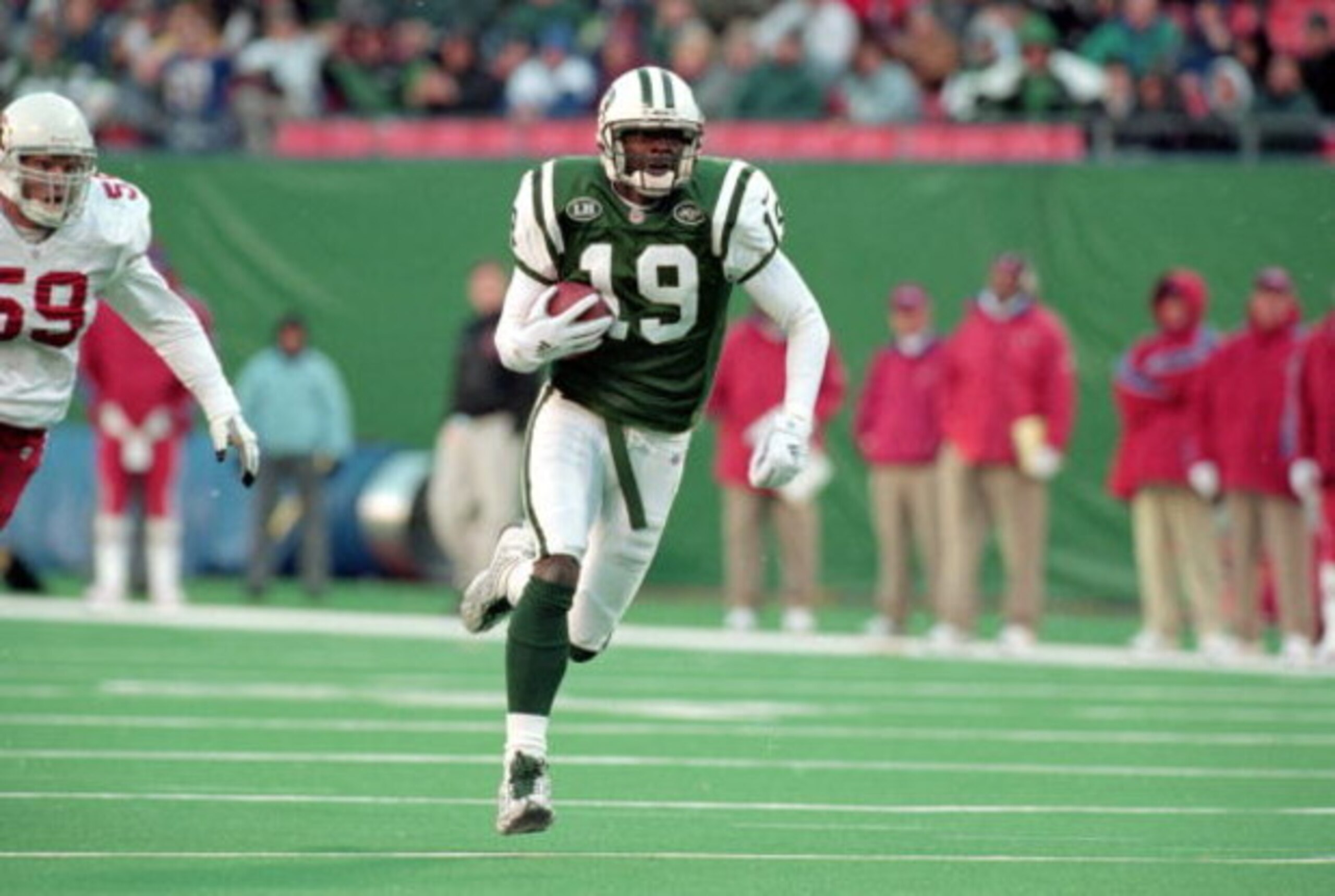 7 Nov 1999: Keyshawn Johnson #19 of the New York Jets carries the ball during a game against the Arizona Cardinals at Giants Stadium in East Rutherford, New Jersey. The Jets defeated the Cardinals 12-7.
