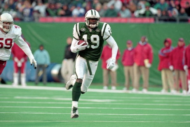 7 Nov 1999: Keyshawn Johnson #19 of the New York Jets carries the ball during a game against the Arizona Cardinals at Giants Stadium in East Rutherford, New Jersey. The Jets defeated the Cardinals 12-7.