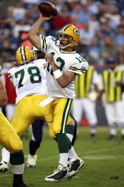 NASHVILLE, TN - SEPTEMBER 3: Aaron Rodgers #12 of the Green Bay Packers throws downfield against the Tennessee Titans during a preseason NFL game at LP Field on September 3, 2009 in Nashville, Tennessee. (Photo by Joe Murphy/Getty Images)