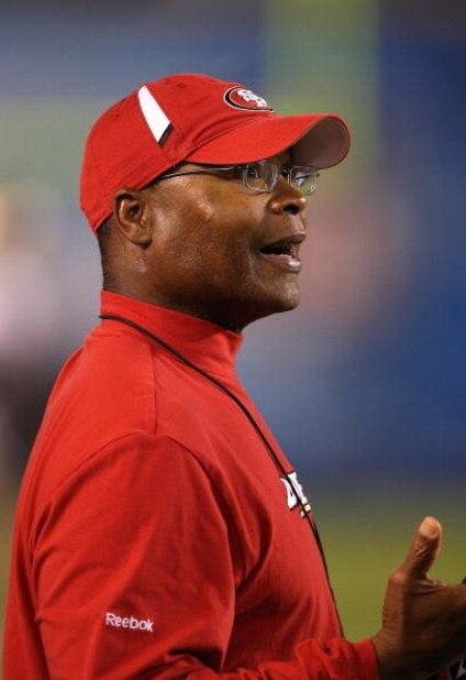 SAN DIEGO - SEPTEMBER 4: Head coach Mike Singletary of the San Francisco 49ers talks on the sidelines during the game with the San Diego Chargers  on September 4, 2009 at Qualcomm Stadium in San Diego, California.   The Chargers won 26-7.  (Photo by Steph