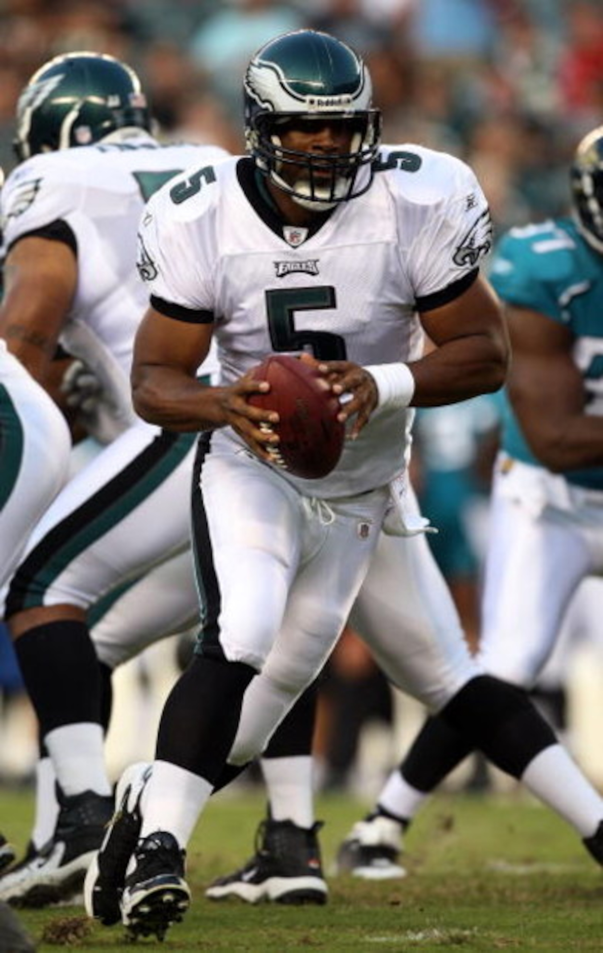 PHILADELPHIA - AUGUST 27:  Donovan McNabb #5 of the Philadelphia Eagles scrambles against the Jacksonville Jaguars on August 27, 2009 at Lincoln Financial Field in Philadelphia, Pennsylvania.  (Photo by Jim McIsaac/Getty Images)