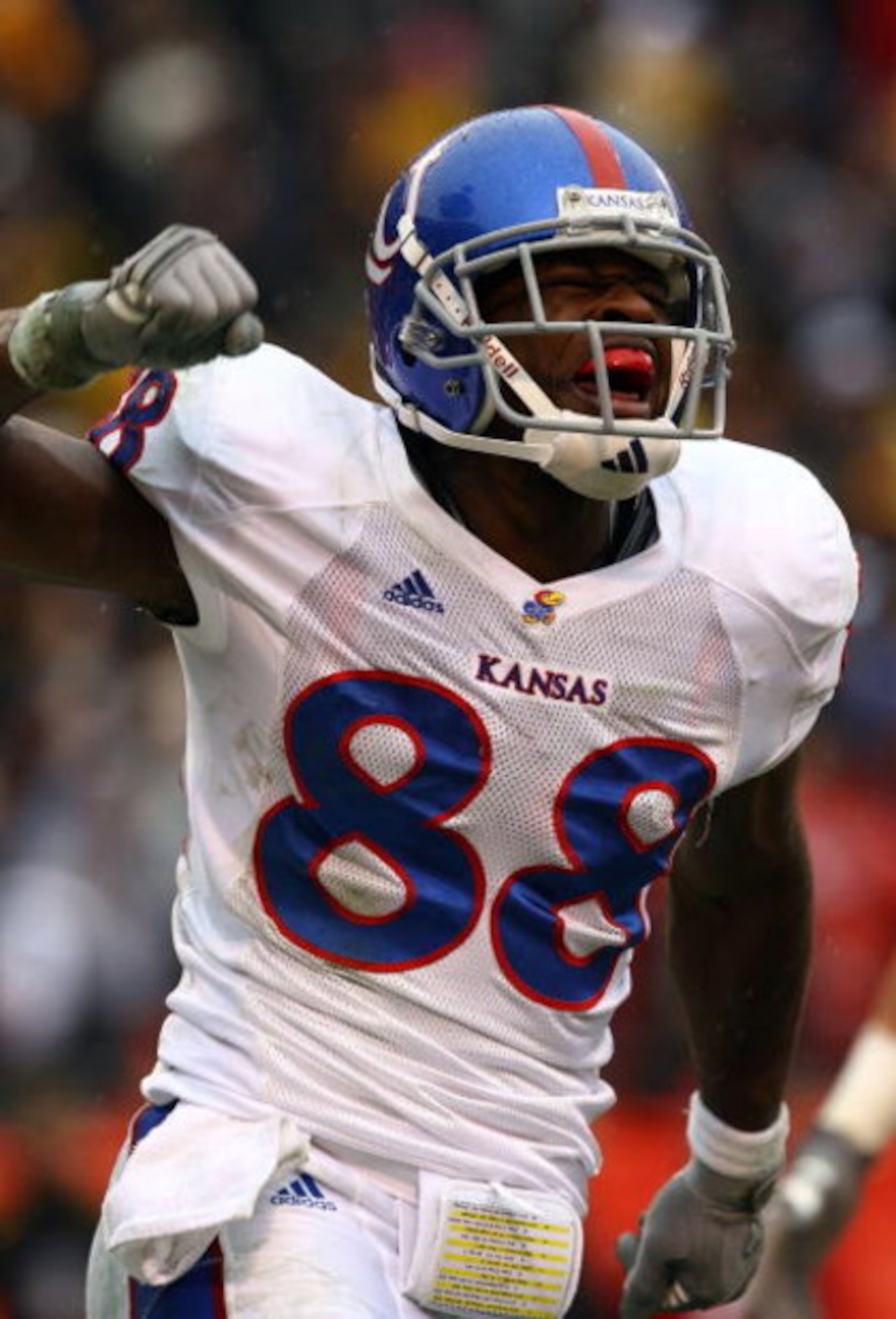 KANSAS CITY, MO - NOVEMBER 29:  Receiver Dexton Fields #88 of the Kansas Jayhawks celebrates after making a touchdown catch during the first half of the game against the Missouri Tigers on November 29, 2008 at Arrowhead Stadium in Kansas City, Missouri.  