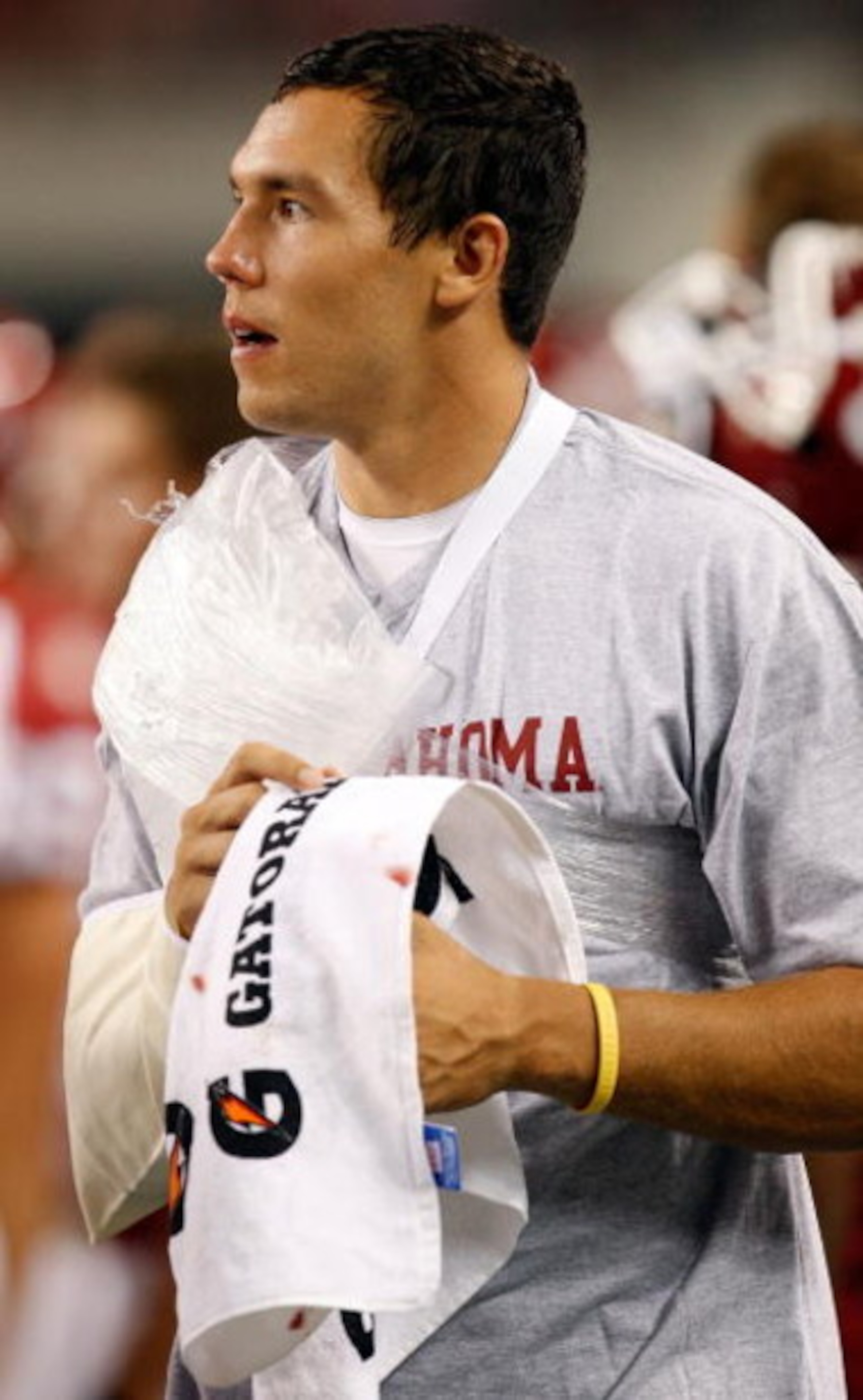 ARLINGTON, TX - SEPTEMBER 05:  Quarterback Sam Bradford #14 of the Oklahoma Sooners on the sidelines after suffering an injury against the Brigham Young Cougars at Cowboys Stadium on September 5, 2009 in Arlington, Texas.  (Photo by Ronald Martinez/Getty 