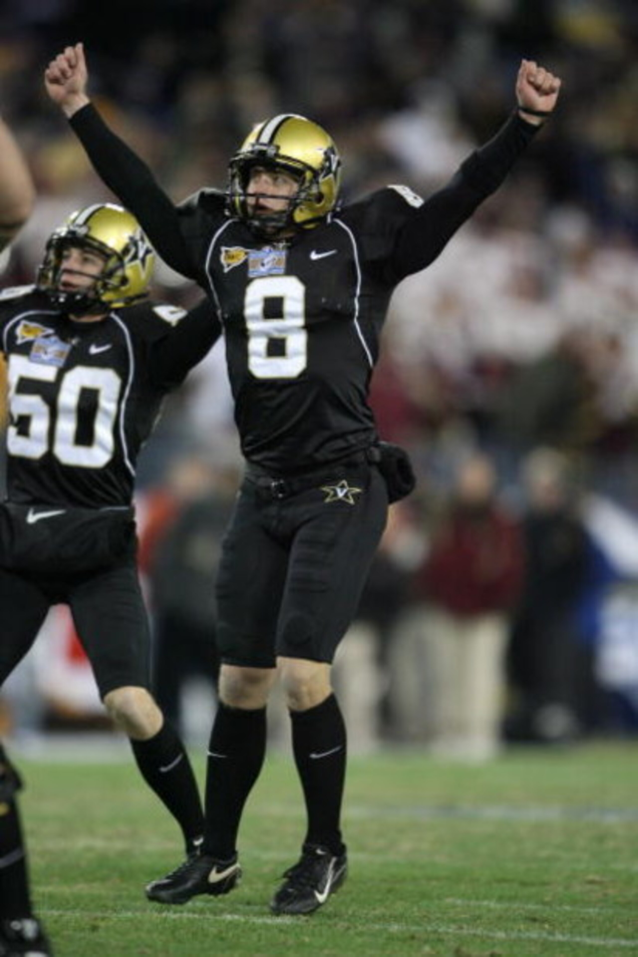 NASHVILLE, TN - DECEMBER 31:  Bryant Hahnfeldt #8 of the Vanderbilt Commodores celebrates against the Boston College Eagles during the Gaylord Hotels Music City Bowl at LP Field on December 31, 2008 in Nashville, Tennessee.  (Photo by Andy Lyons/Getty Ima