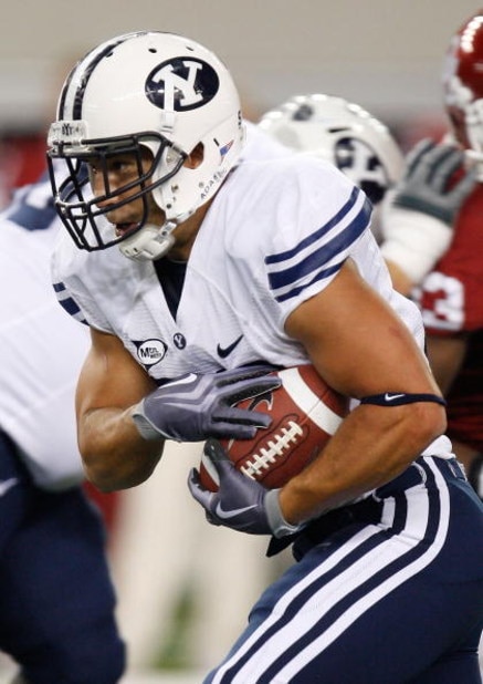 ARLINGTON, TX - SEPTEMBER 05:  Running back Bryan Kariya #33 of the Brigham Young Cougars at Cowboys Stadium on September 5, 2009 in Arlington, Texas.  (Photo by Ronald Martinez/Getty Images)