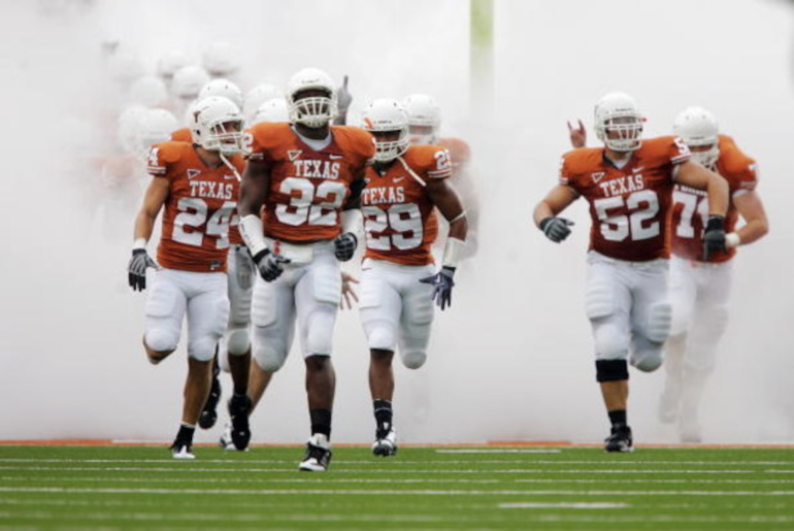 AUSTIN, TX - SEPTEMBER 5:  Defensive end Eddie Jones #31 of the Texas Longhorns leads the team onto the field for their first game, a game against the Louisiana Monroe Warhawks, on September 5, 2009 at Darrell K Royal-Texas Memorial Stadium in Austin, Tex