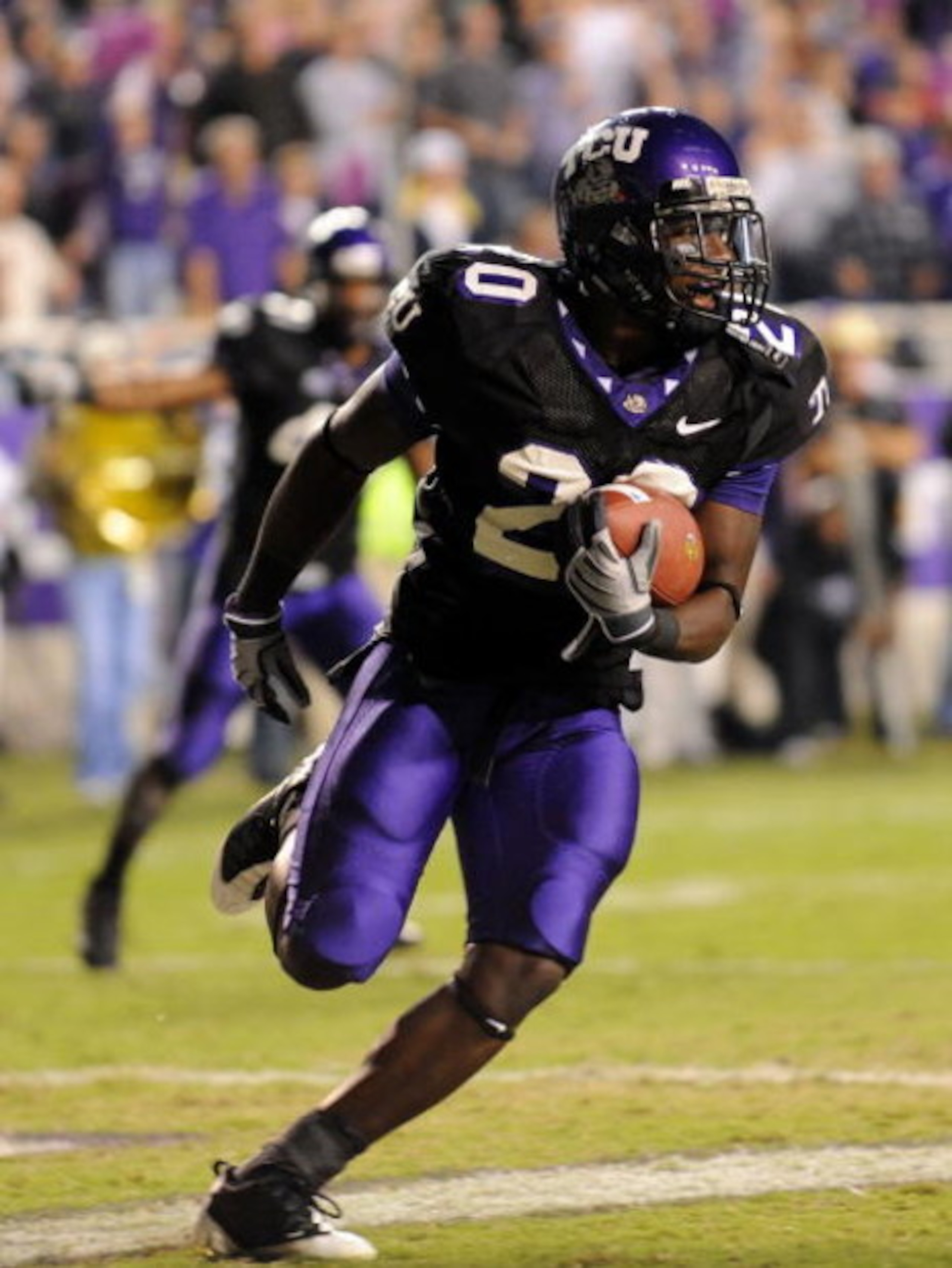 FORT WORTH, TX - OCTOBER 16: Cornerback Nick Sanders #20 of the TCU Horned Frogs makes a pass interception in the endzone against Austin Collie #9 of the BYU Cougars at Amon G. Carter Stadium on October 16, 2008 in Fort Worth, Texas. (Photo by Ronald Ma FORT WORTH, TX - OCTOBER 16: Cornerback Nick Sanders #20 of the TCU Horned Frogs makes a pass interception in the endzone against Austin Collie #9 of the BYU Cougars at Amon G. Carter Stadium on October 16, 2008 in Fort Worth, Texas. (Photo by Ronald Ma